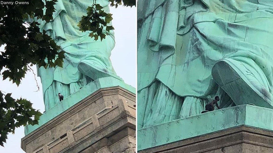Woman climbs Statue of Liberty; Liberty Island evacuated 