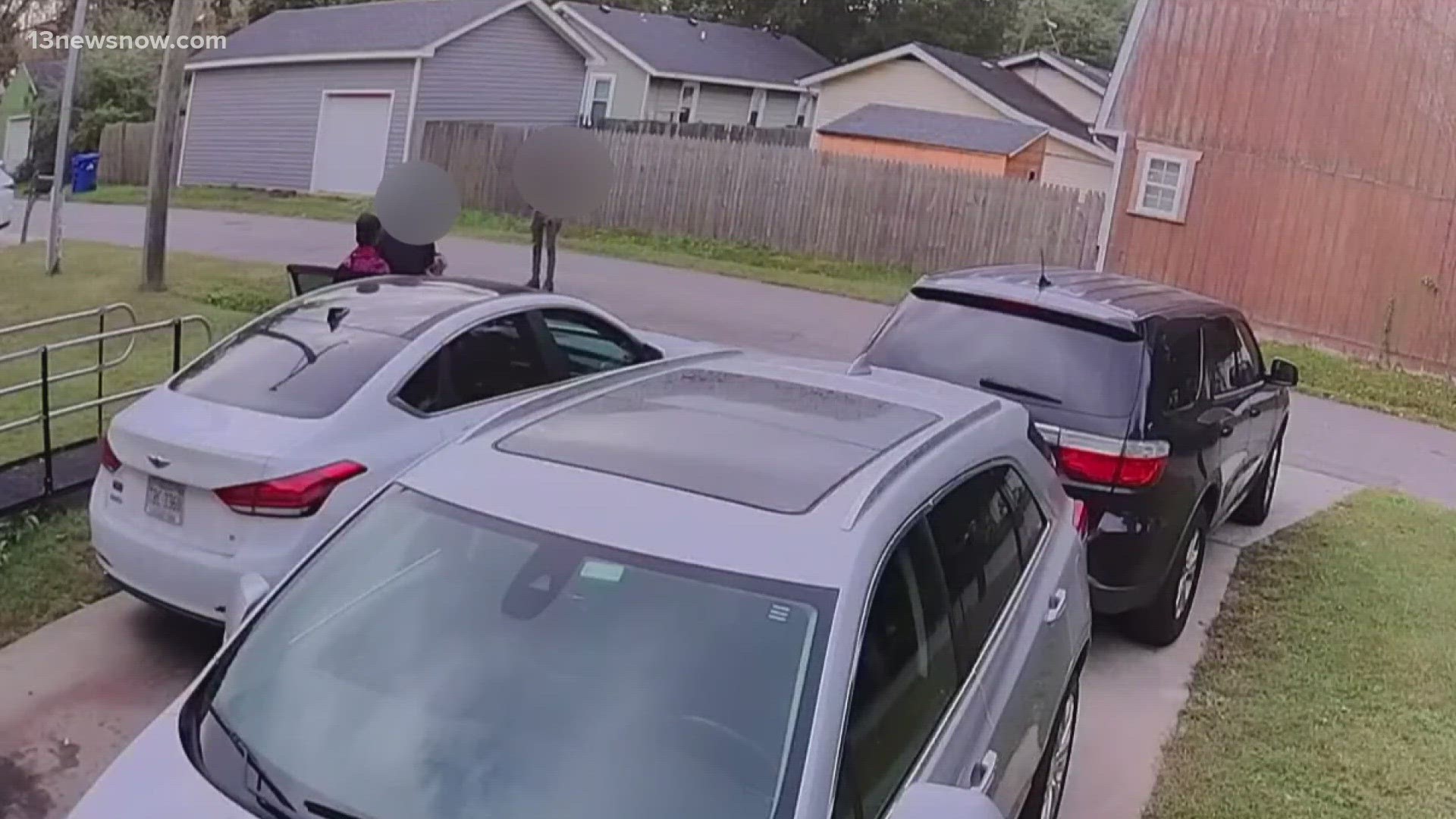 A home security camera caught the moment two juveniles approached a Portsmouth woman with a gun and stole her car in broad daylight.