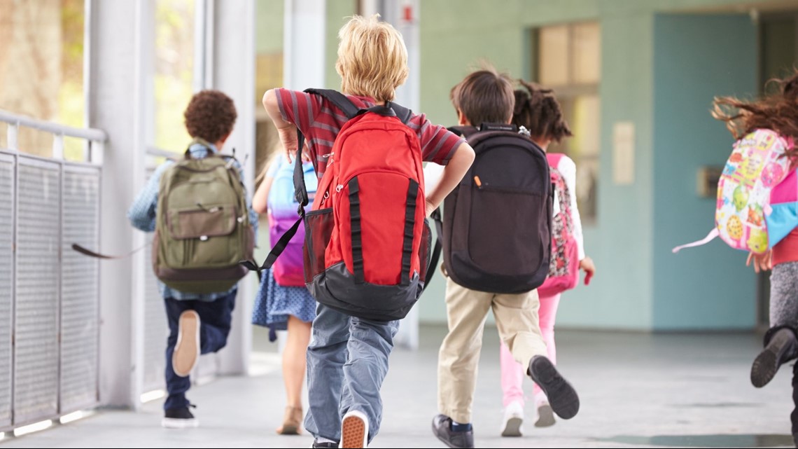 Back-to-school event gives students free haircuts and backpacks