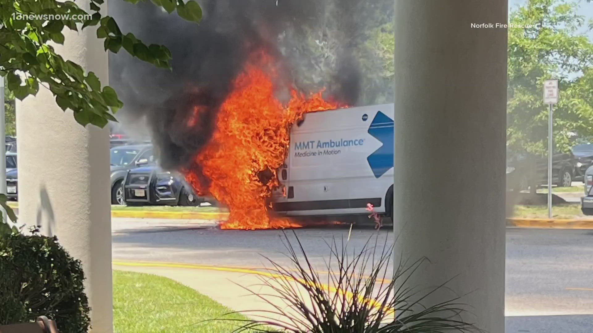 Photos provided by the fire department show the ambulance's engine compartment completely engulfed in flames.