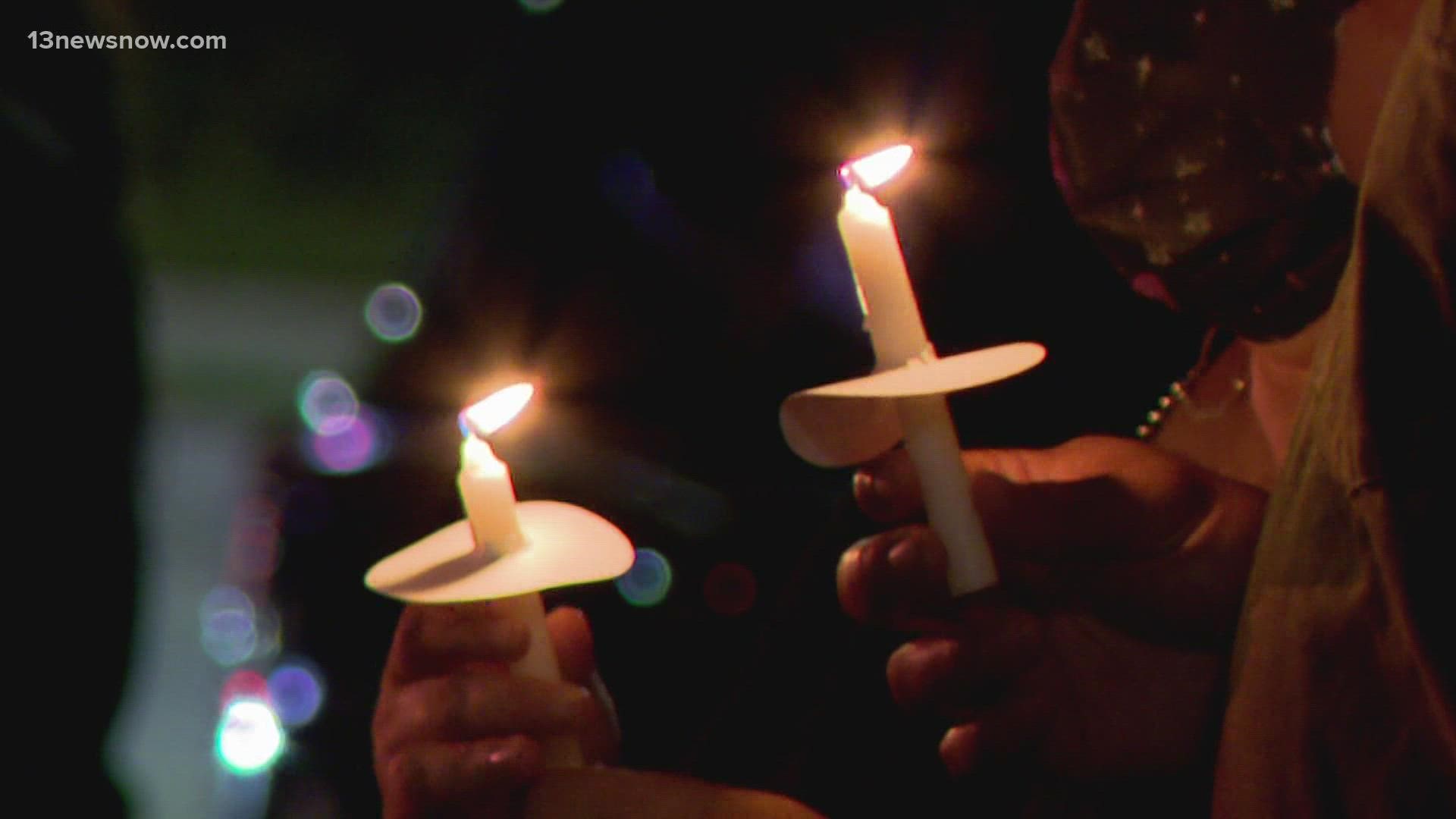 Funeral homes full, candles lit for those killed in mall shooting