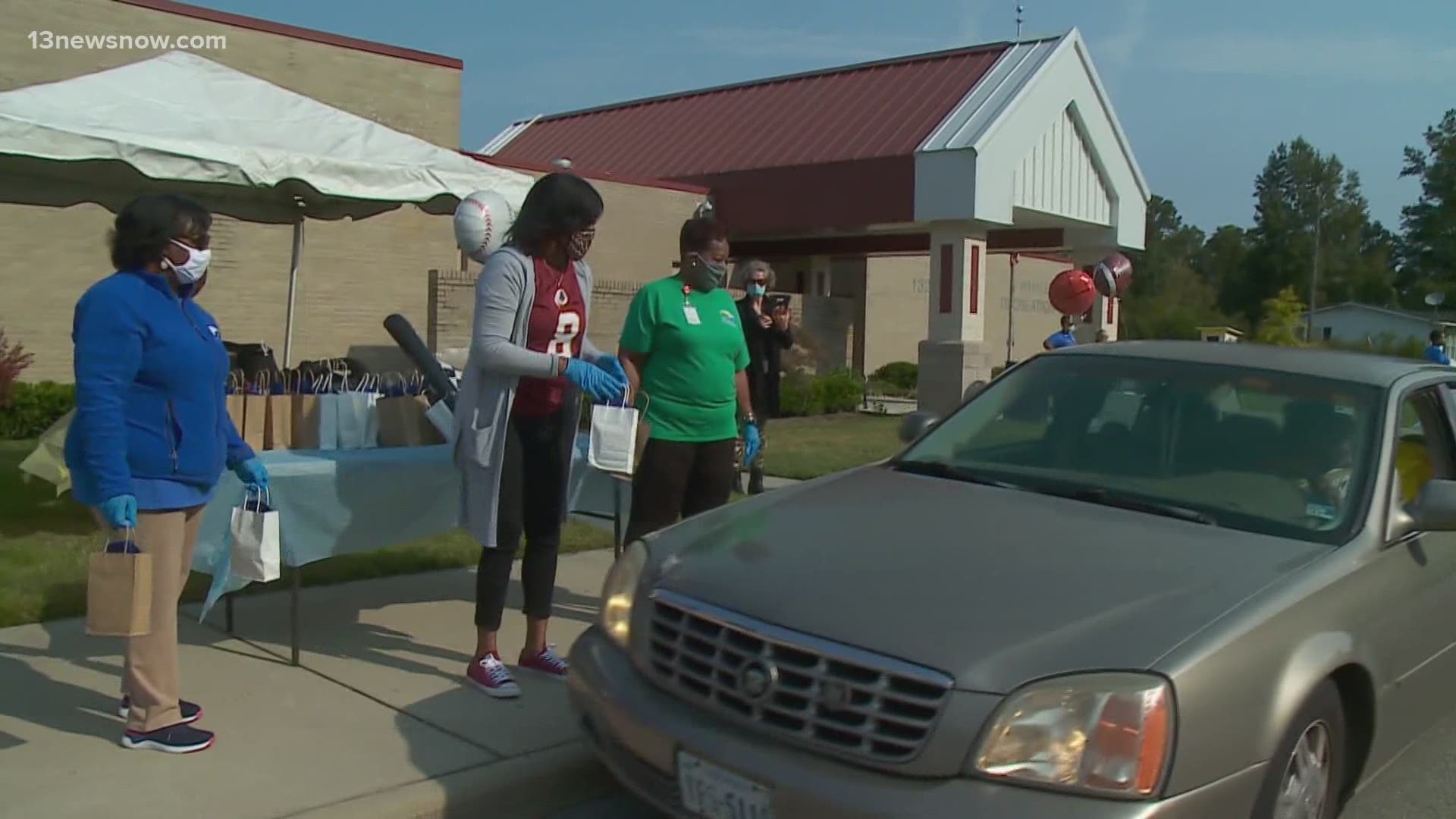 The drive-thru parade featured goodie bags for senior citizens who aren't able to get out as much due to the pandemic. 13News Now Madison Kimbro has the story.