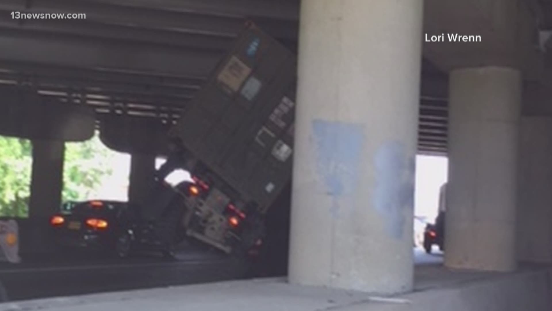 A military vehicle got stuck under the I-264 overpass in Virginia Beach.
