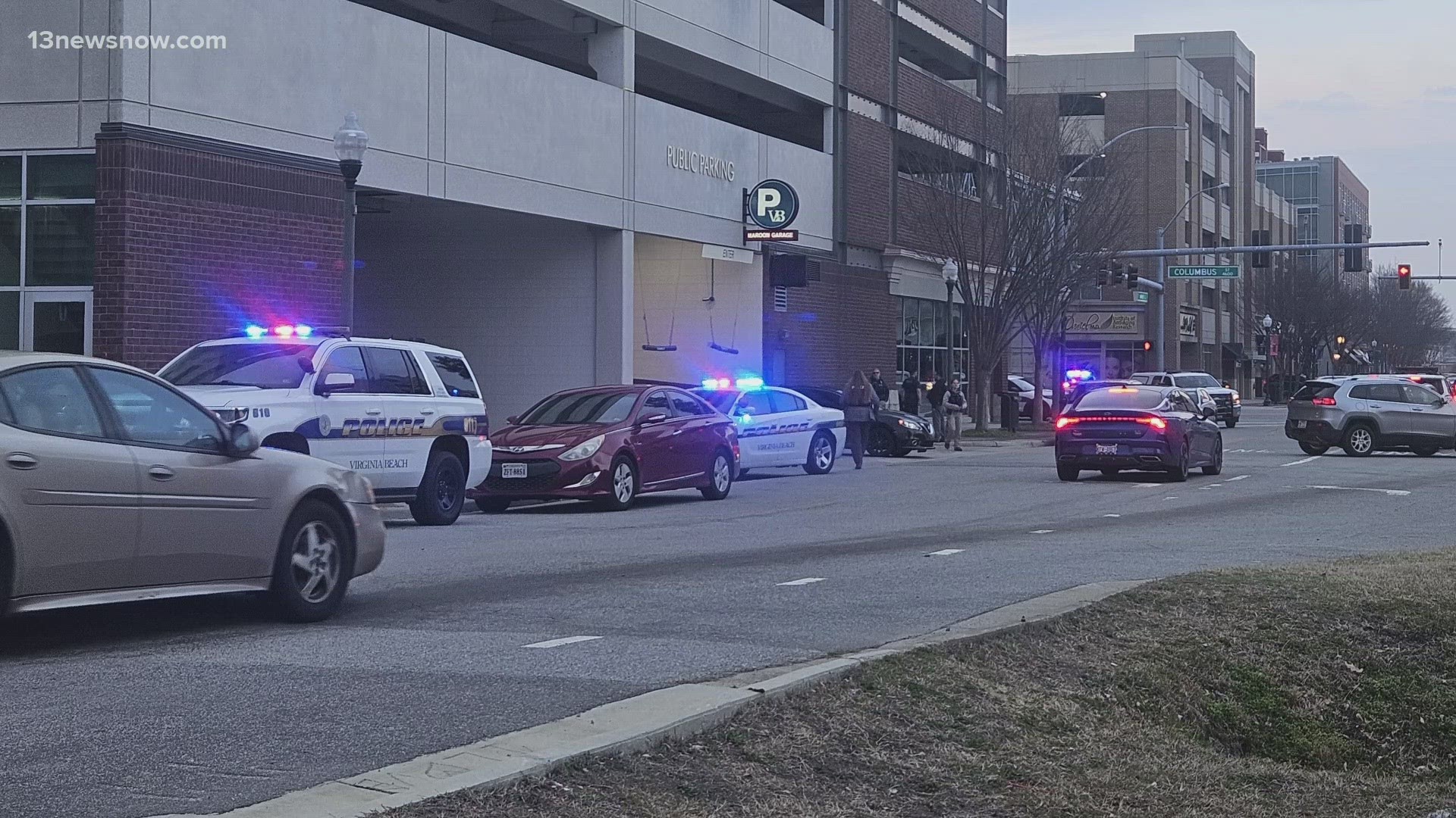 Police say they are investigating shots fired in a Virginia Beach Town Center parking garage.