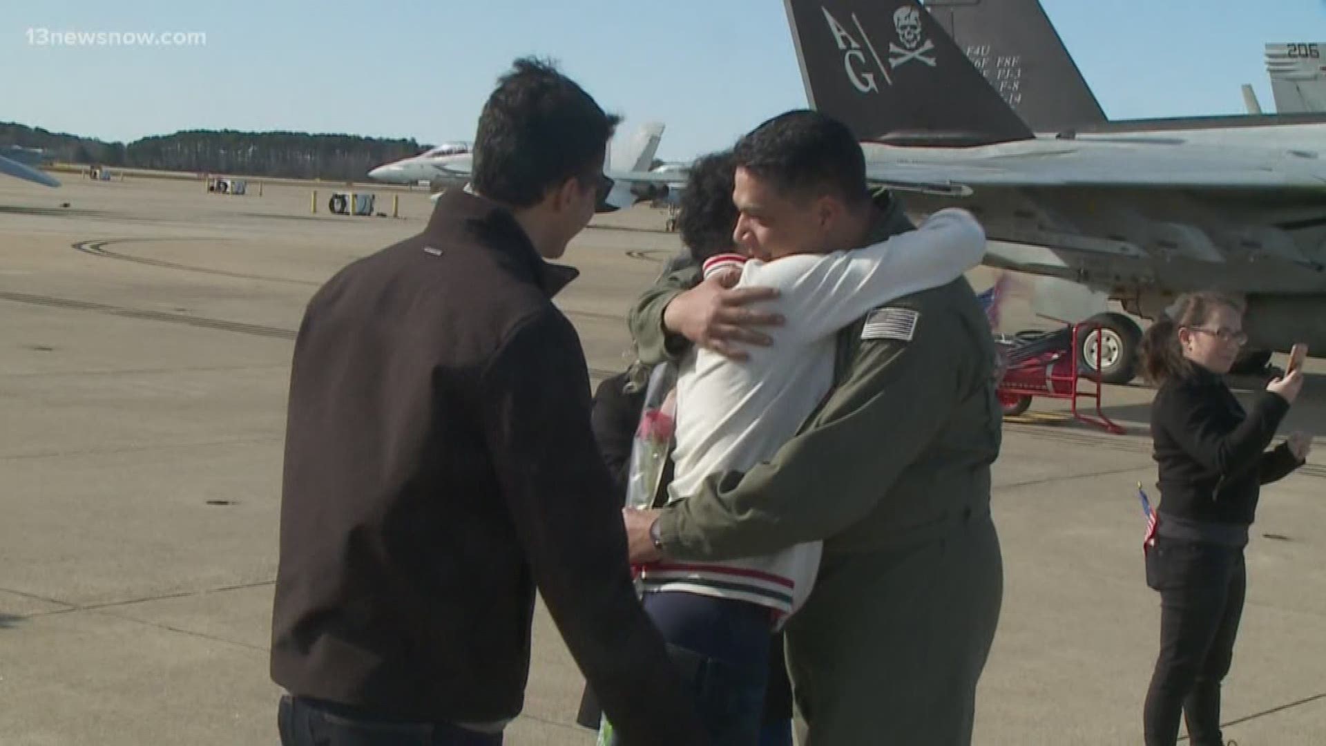 More than 100 Navy pilots and crew members returned to Naval Air Station Oceana and Norfolk Naval Station on Sunday after a nearly 10-month deployment.