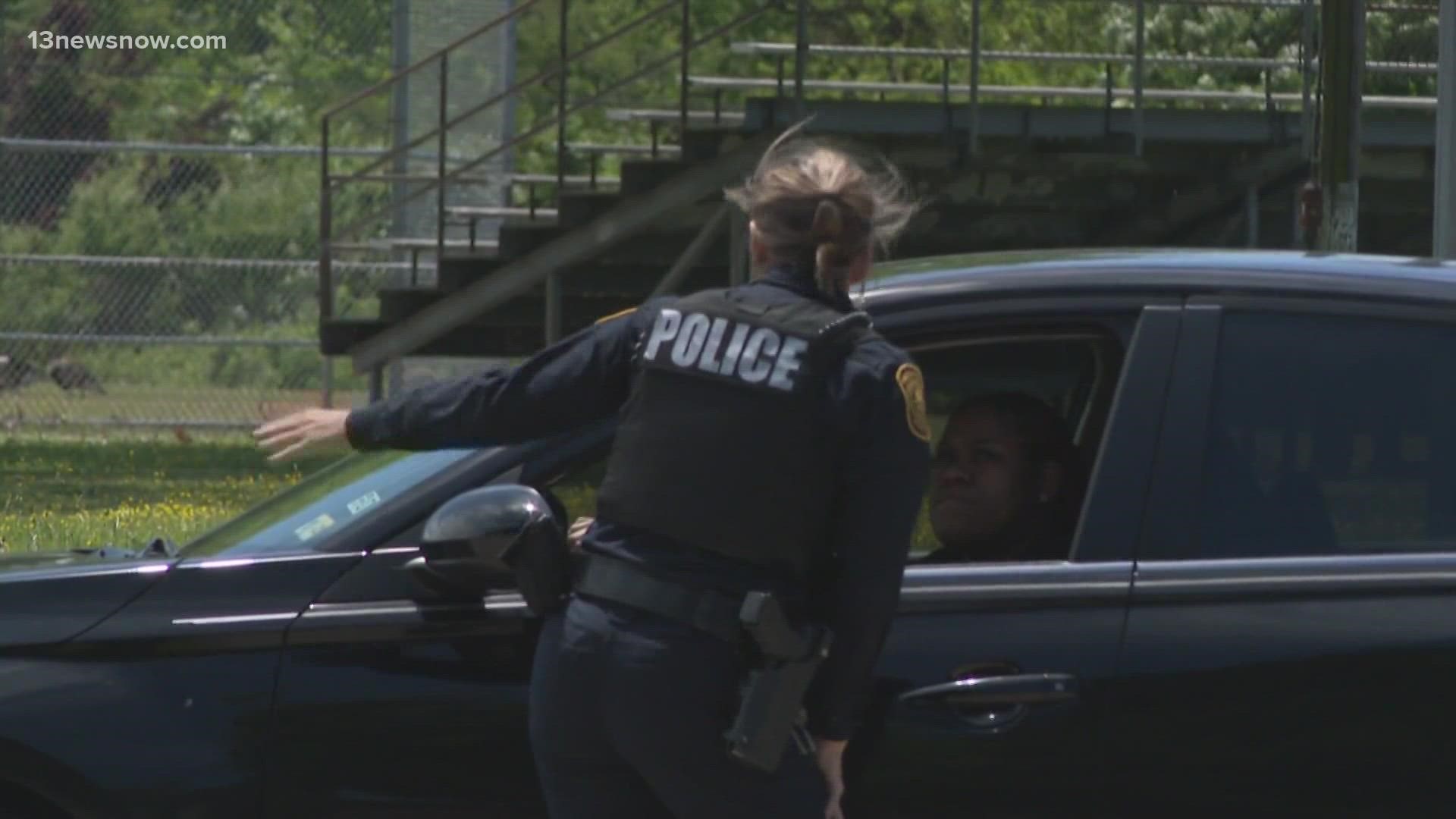 Parents came rushing to the Norfolk schools to pick up their children after there were reports of a person with a weapon there. Two students were detained.