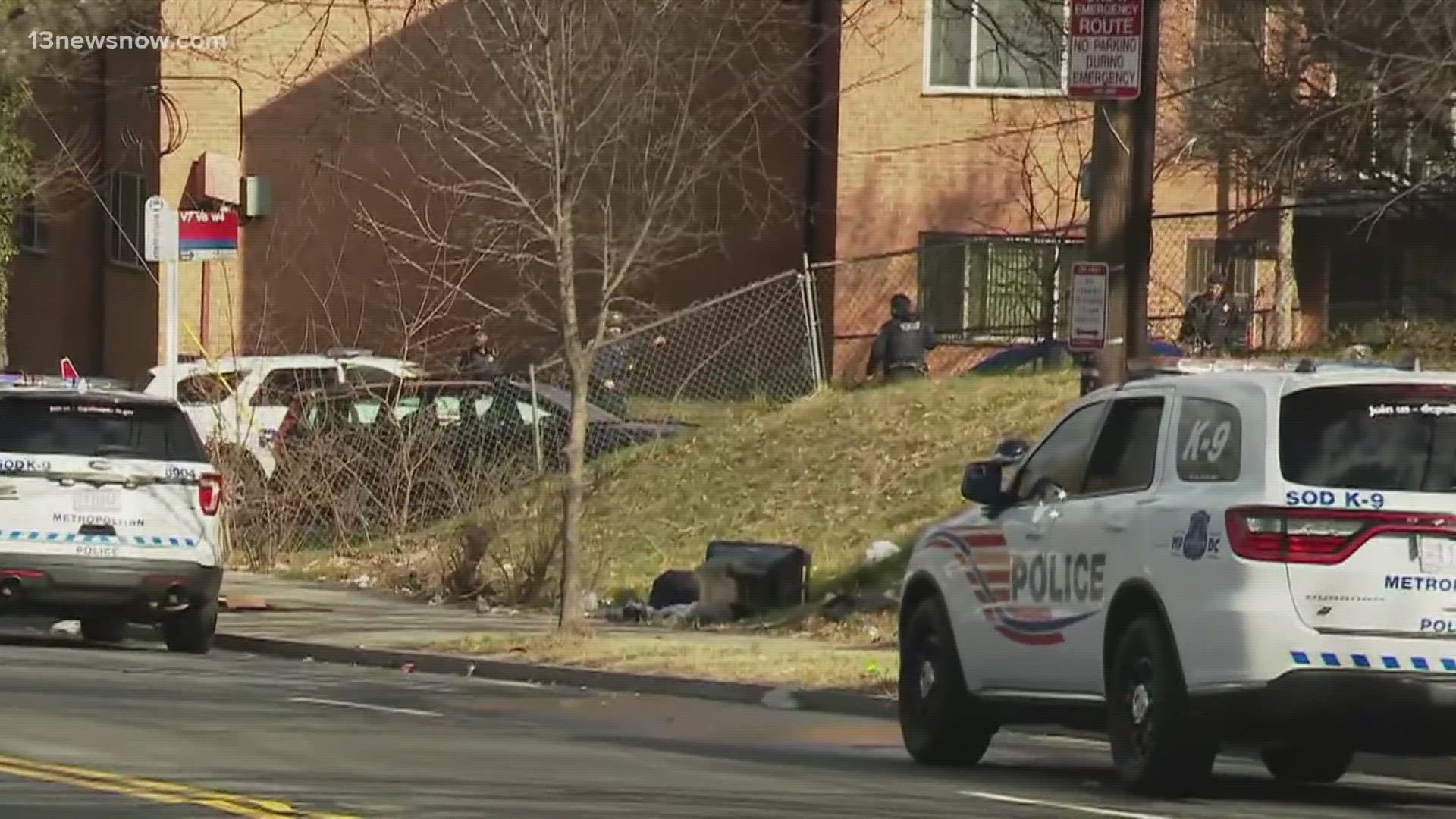 Police negotiators on the scene of the barricade situation.