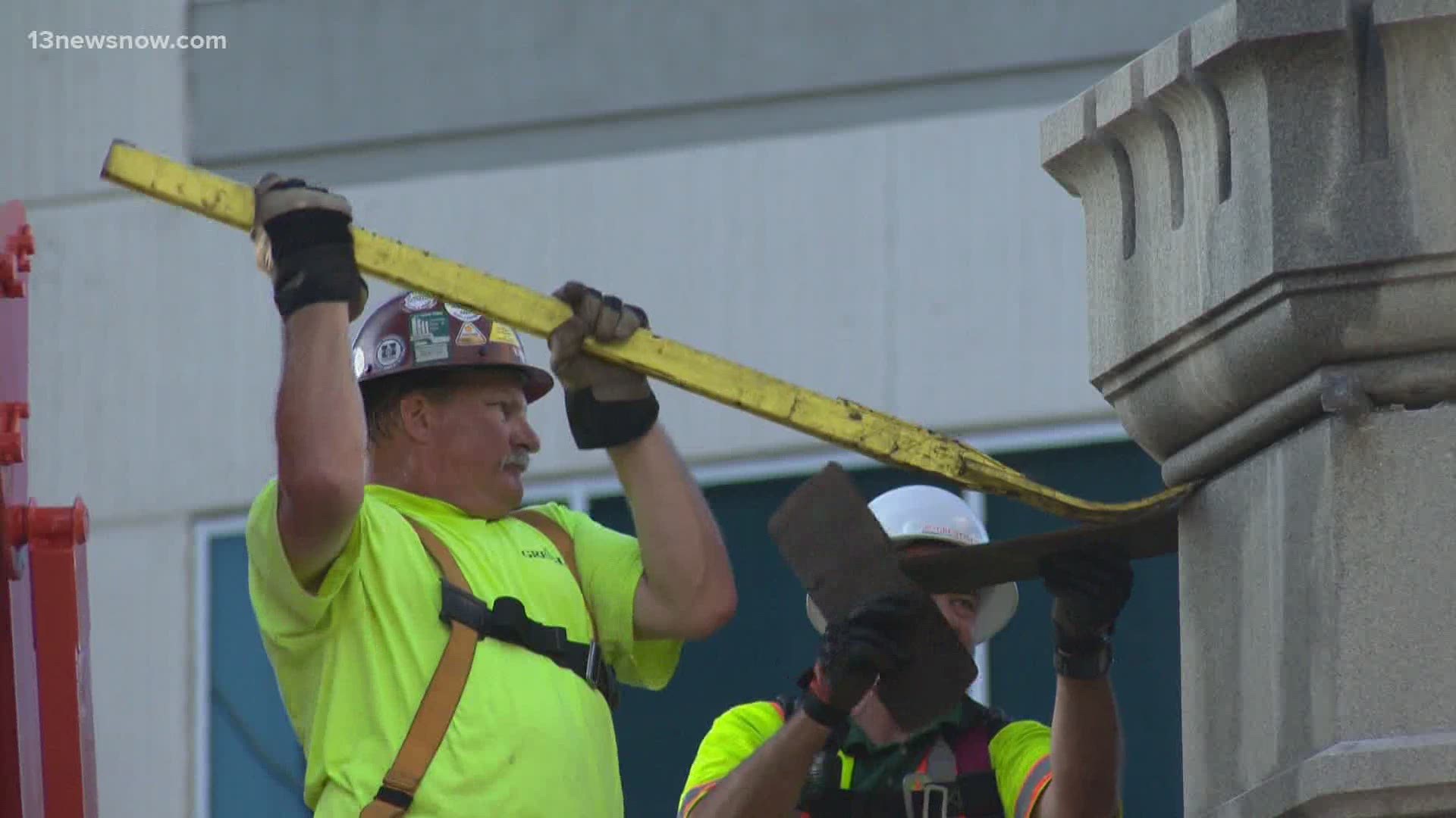 Crews worked quickly to take down the column after removing the statue last week, and the pillars yesterday.