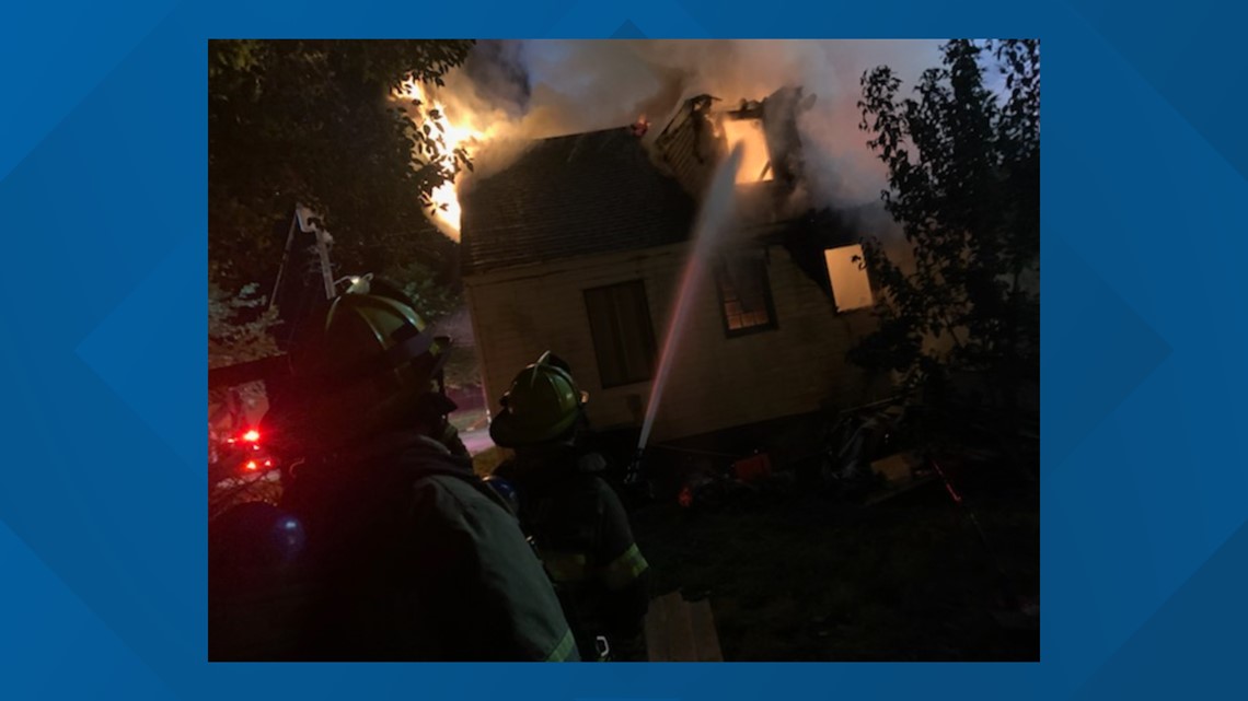 Portsmouth firefighter sent to hospital after crews battle house fire