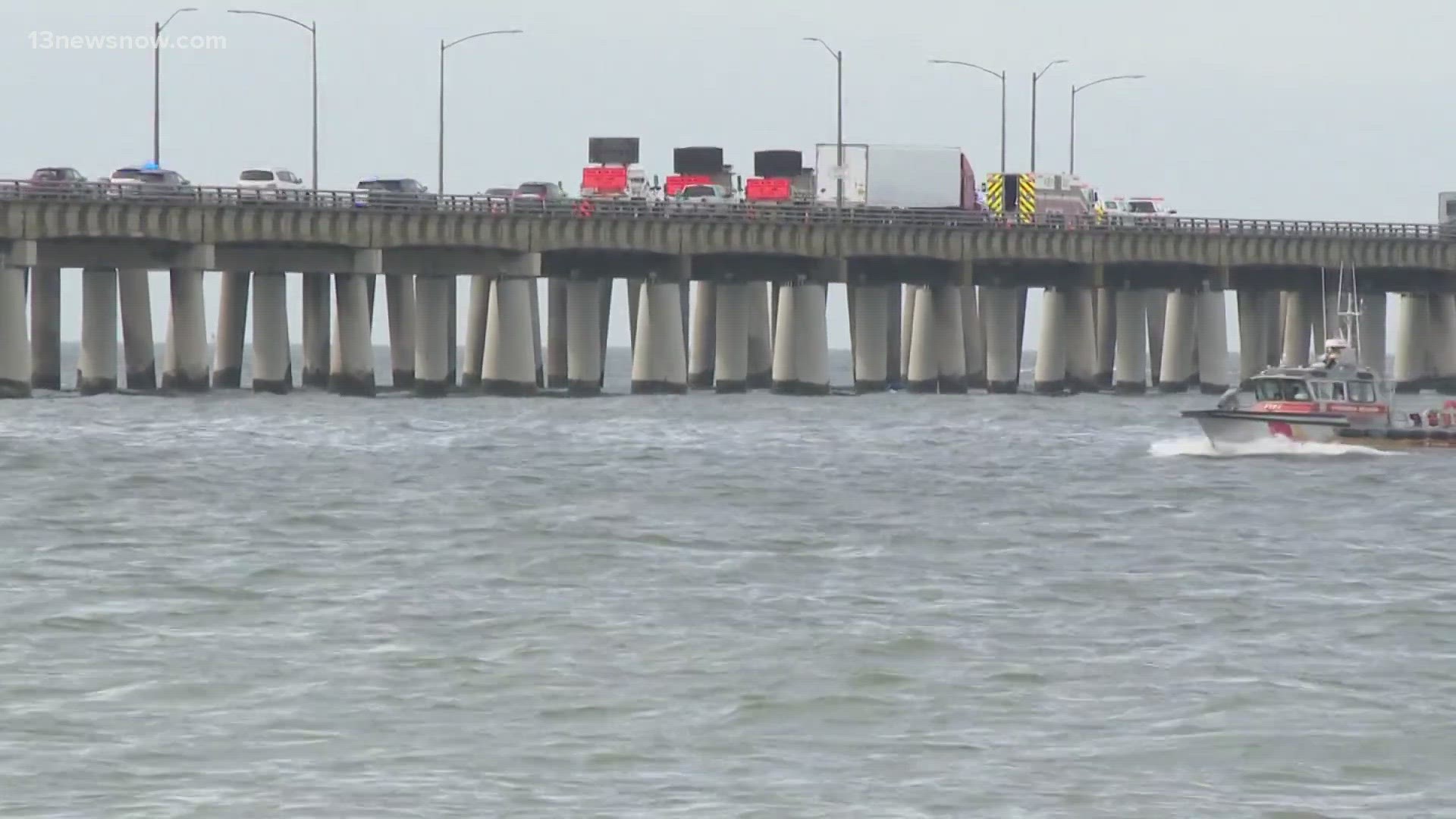 Officials say the truck went into the water on the west side of the northbound span, between Virginia Beach and the southernmost island.