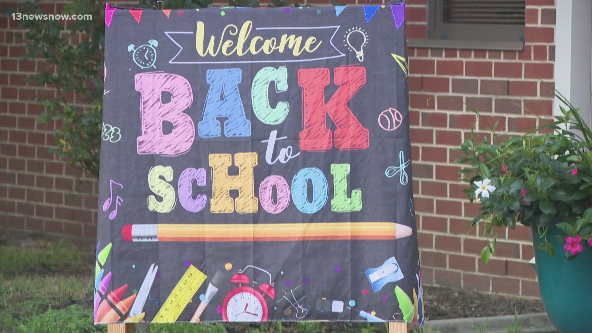 School staff, signs and new safety measures greeted students as they came back to school.