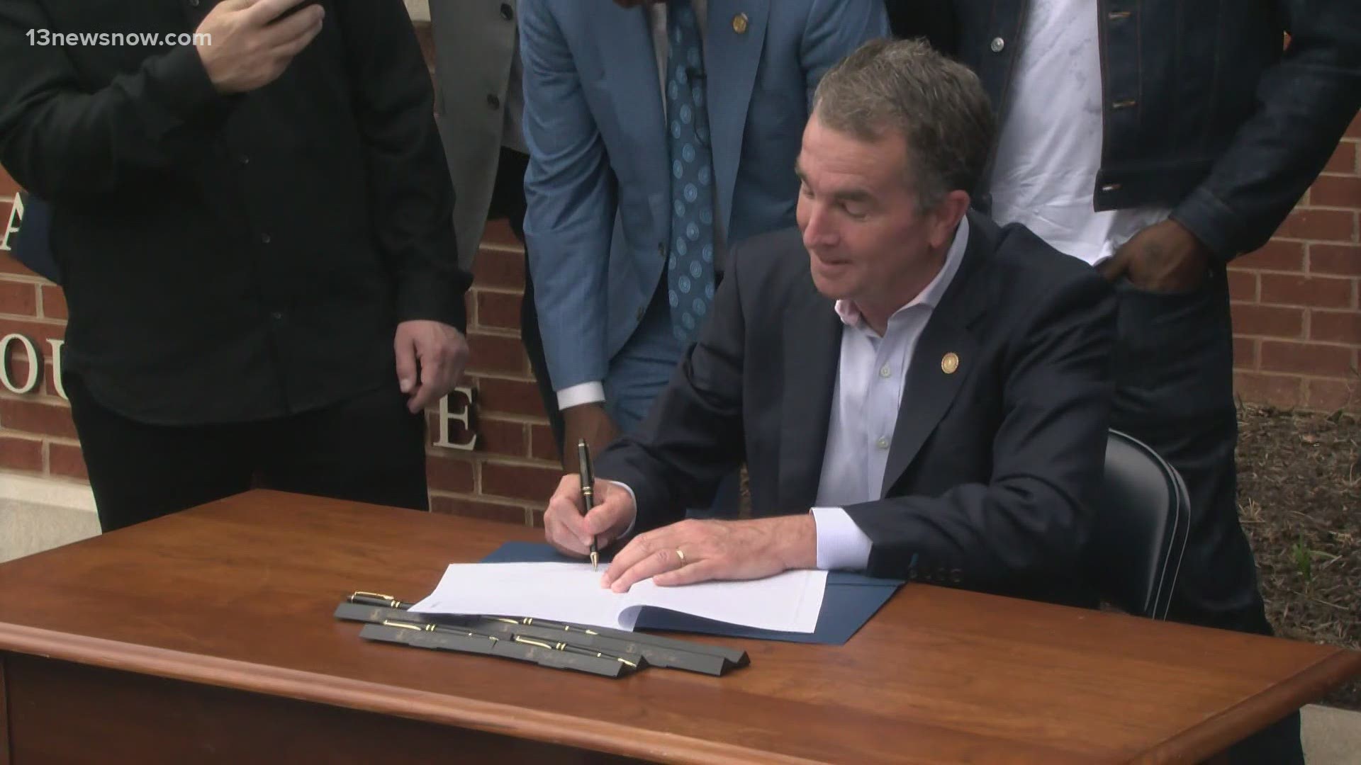 Changing the probation system in Virginia: that's the goal of a rapper who stood with Governor Ralph Northam as he signed a new bill to limit probation terms.