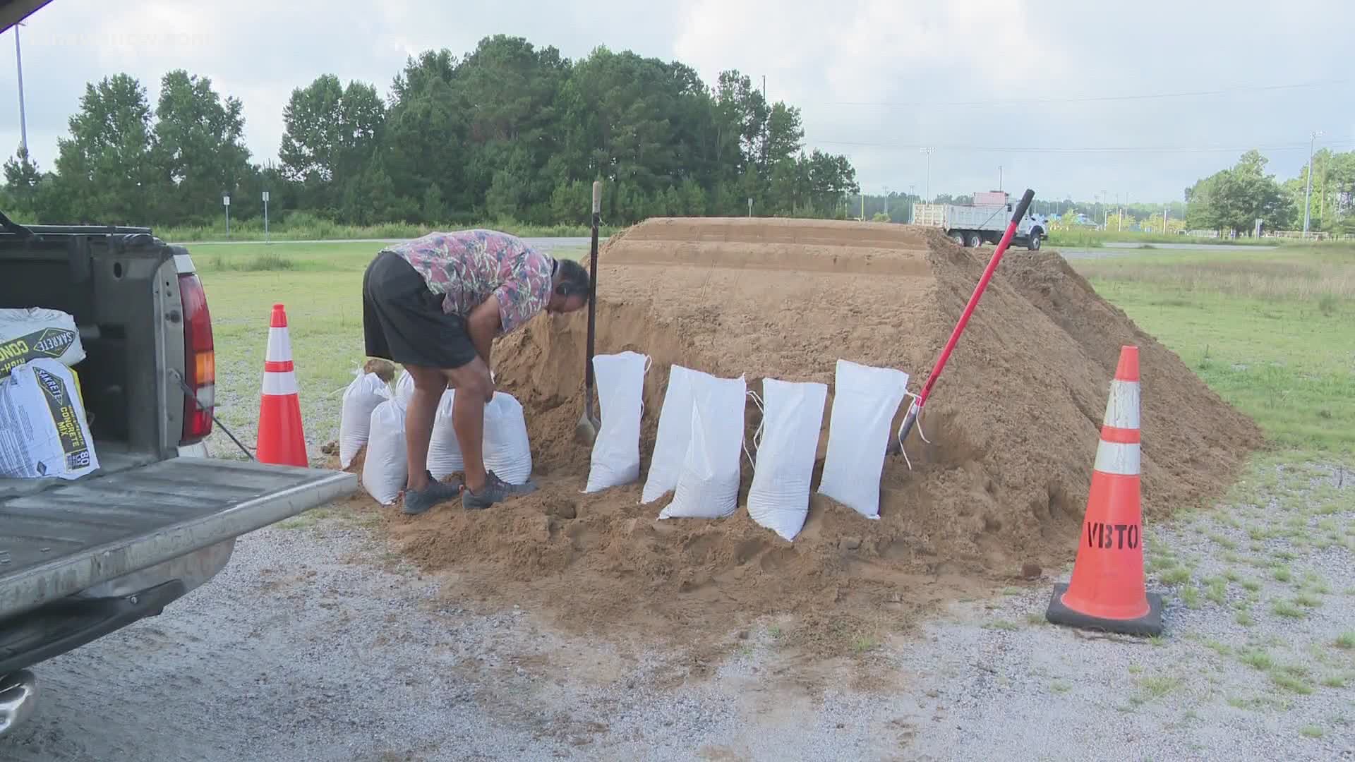 People had to bring their own bags and shovel to gather the sand. The hope is that it will keep homes safe from flooding.