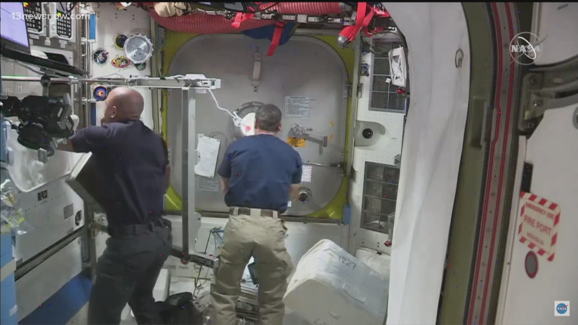 The spacewalking astronauts are preparing International Space Station for new solar arrays.
