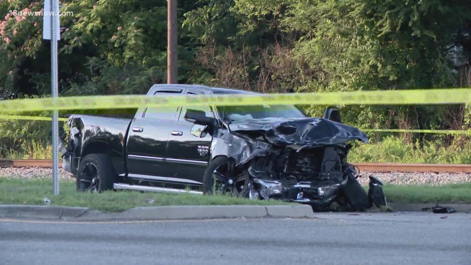 A two-vehicle crash in Portsmouth left two people dead and two others hurt, according to the police department.