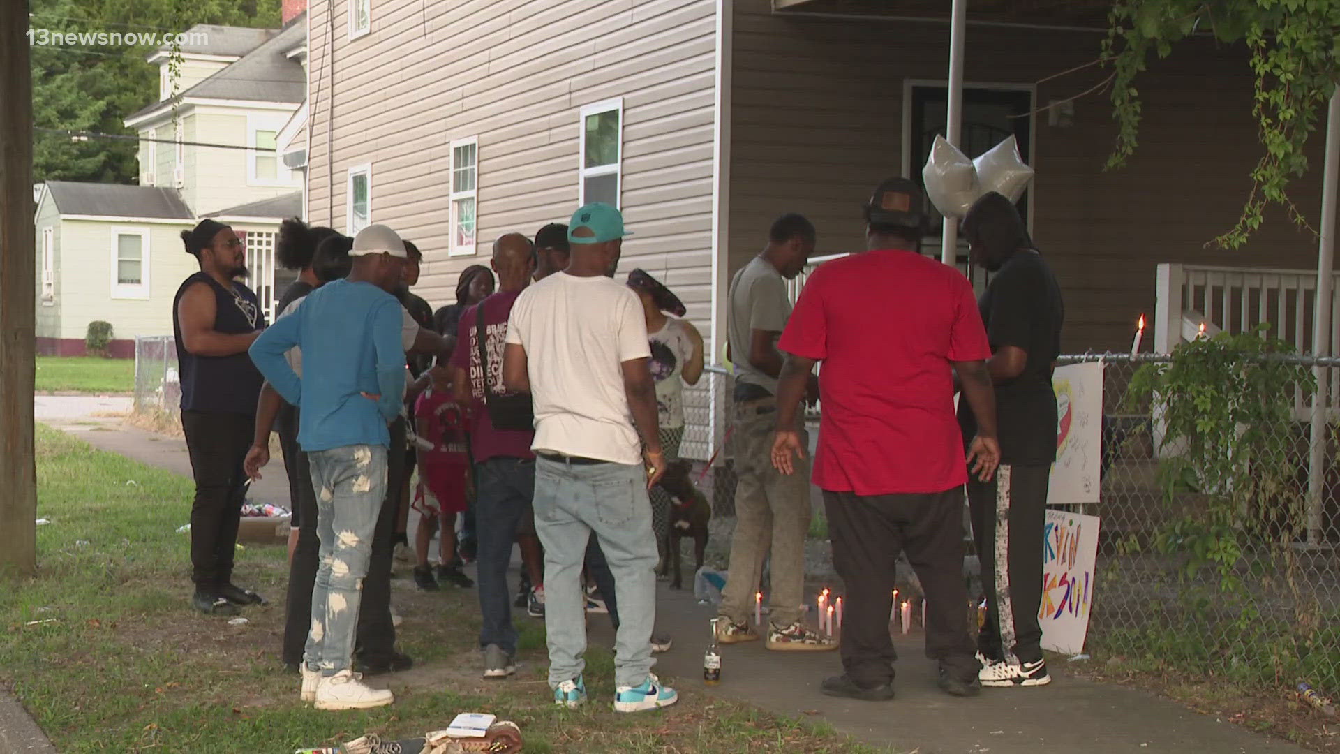 A vigil held Friday night at Roanoke Avenue and 33rd Street honored the memory of Marvin Jackson.