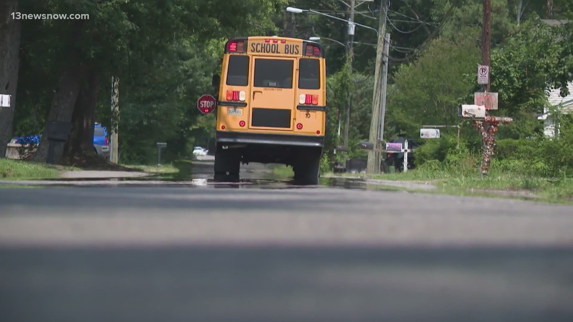 According to a message sent to the parents of students, the woman boarded the bus wearing a mask and carrying a bag and scissors.