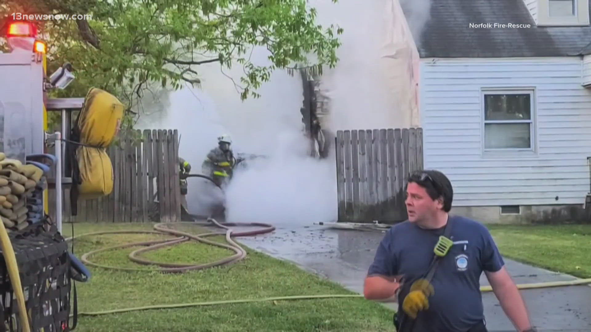 Four people have been displaced after an electric car fire spread to their home Tuesday morning.