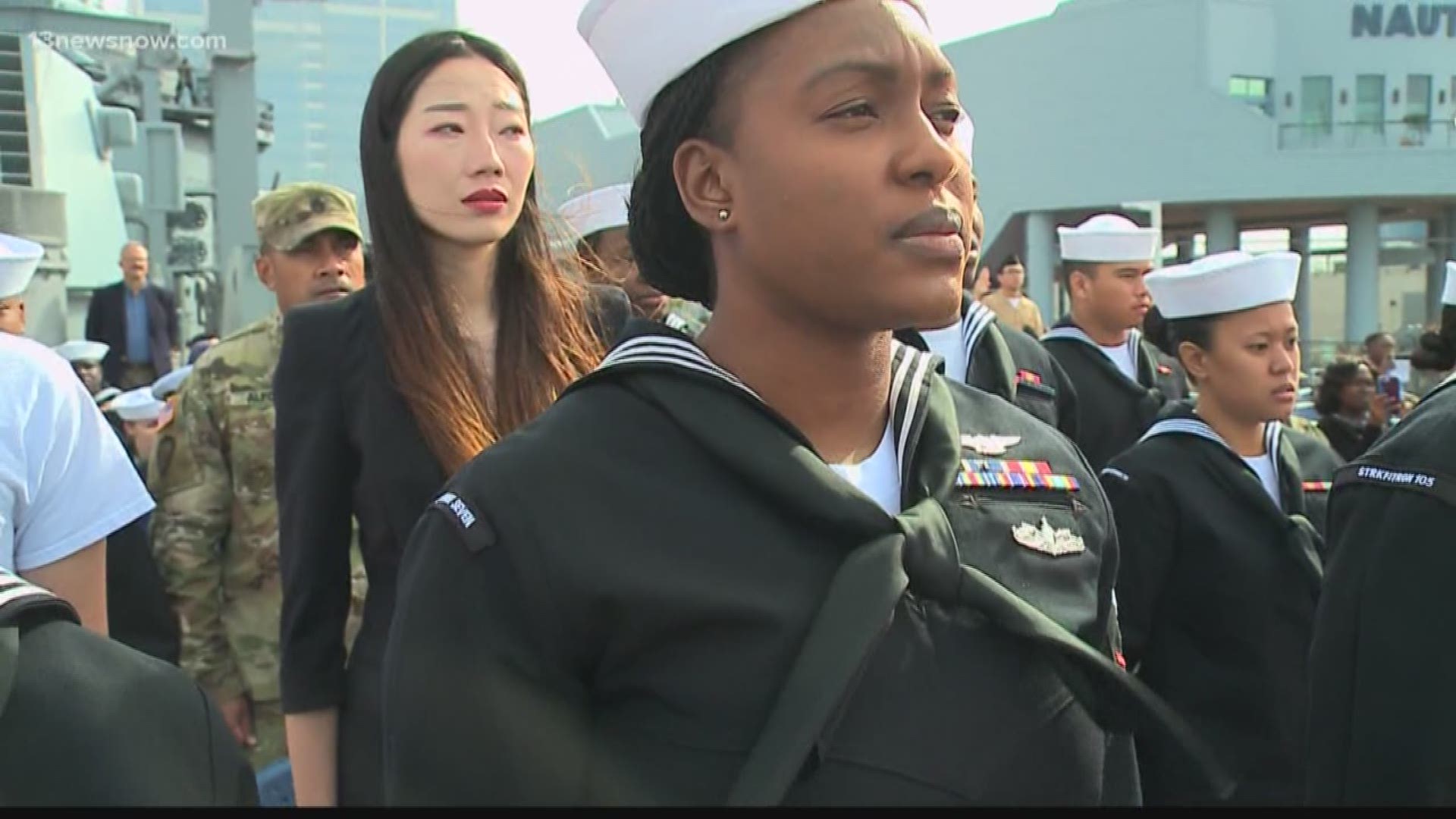 Aboard the battleship Wisconsin active duty military personnel from 13 different countries were formally naturalized.