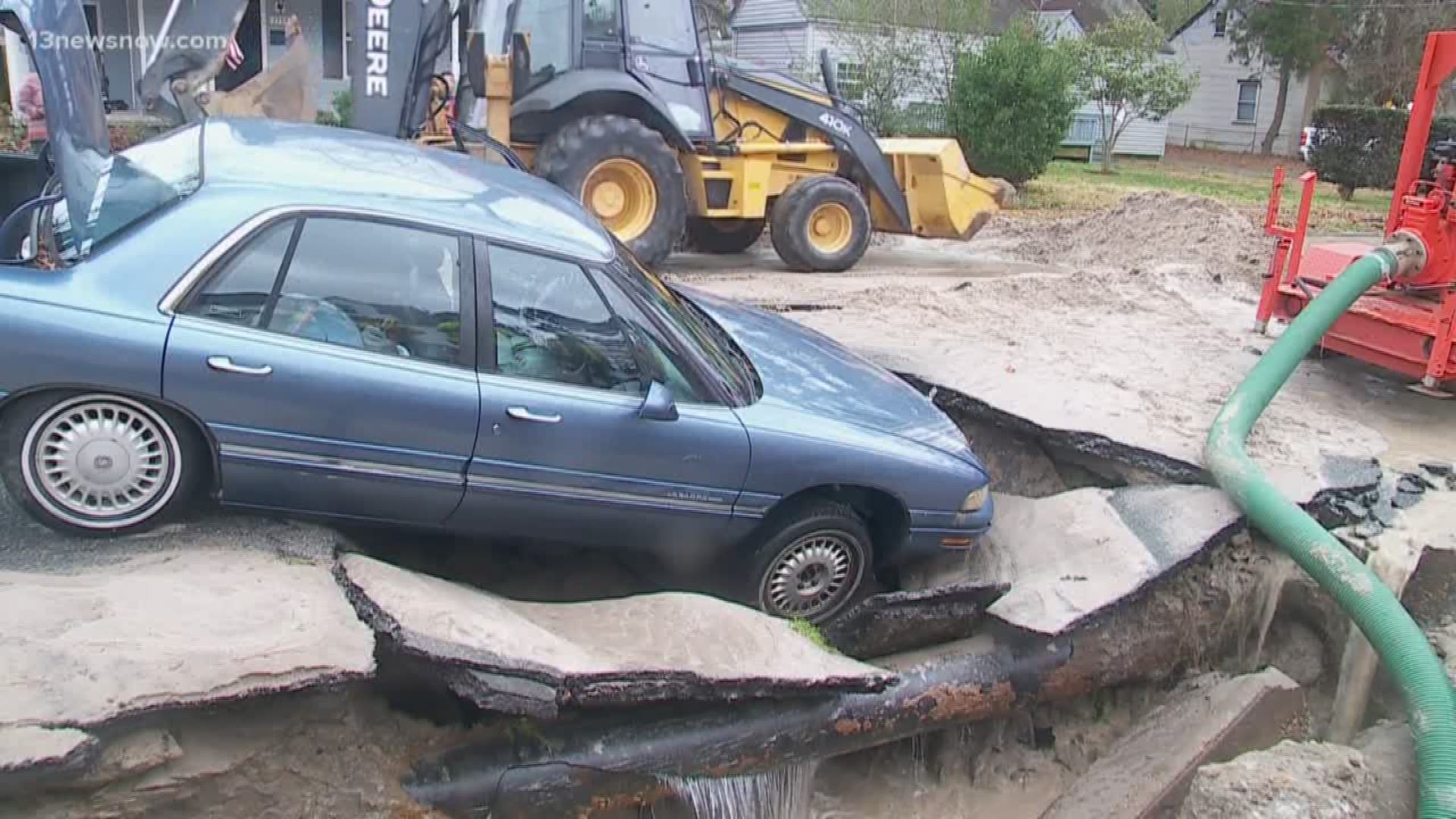 A sinkhole opened up in the Bay View area of Norfolk trapping one car. The driver was able to escape safely.