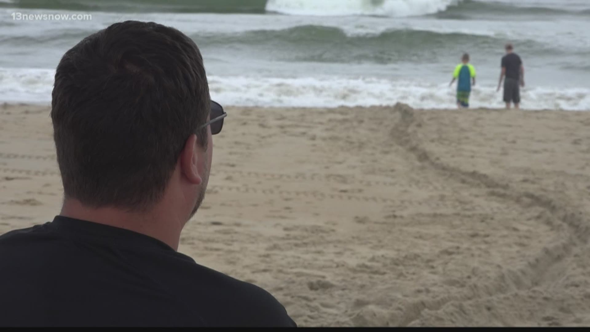 The warning over rip currents comes after one swimmer goes missing and another is found dead.