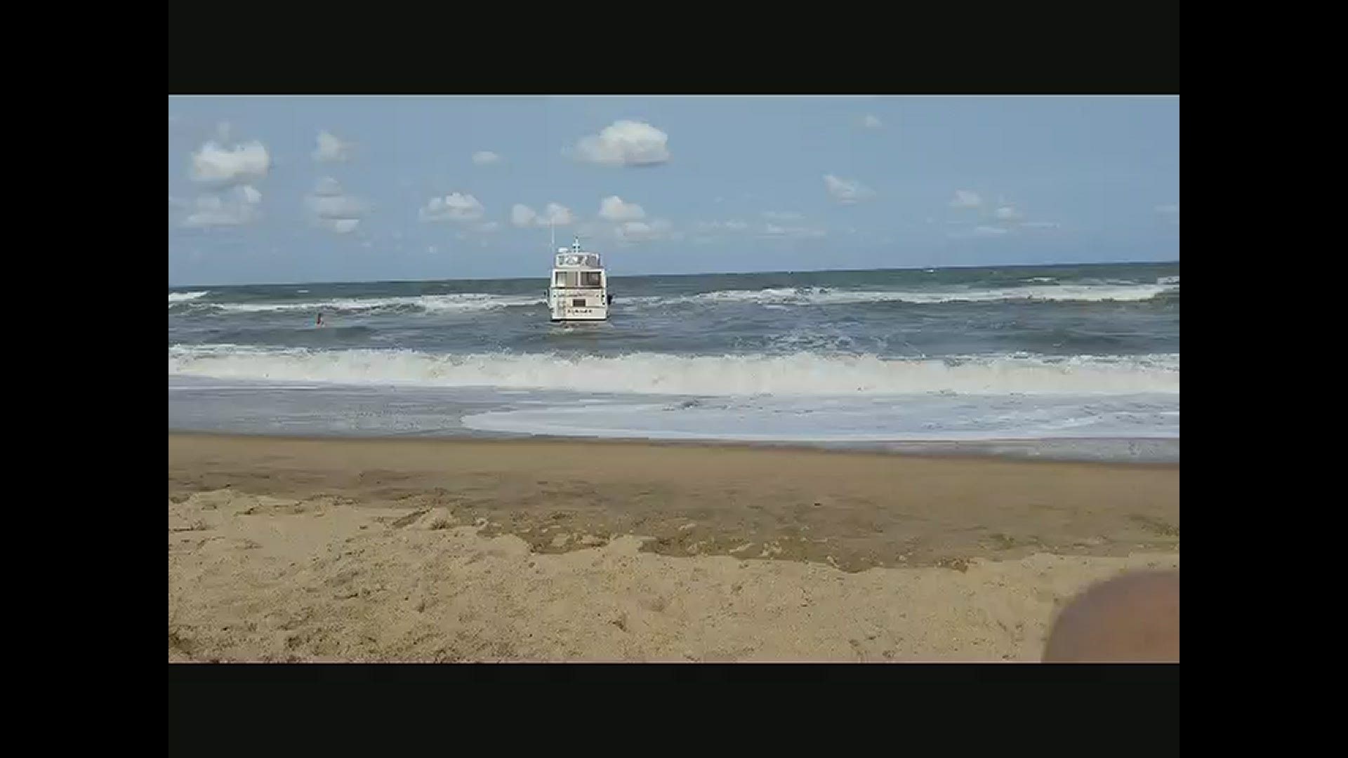 A boat broke down and drifted onto the shores of Virginia Beach. Two people were on board, but weren't hurt.