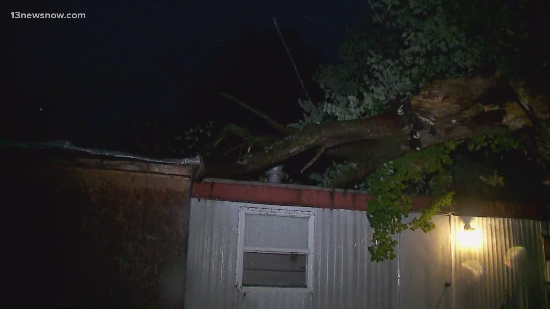 A huge tree fell on top of a trailer home in Poquoson.
