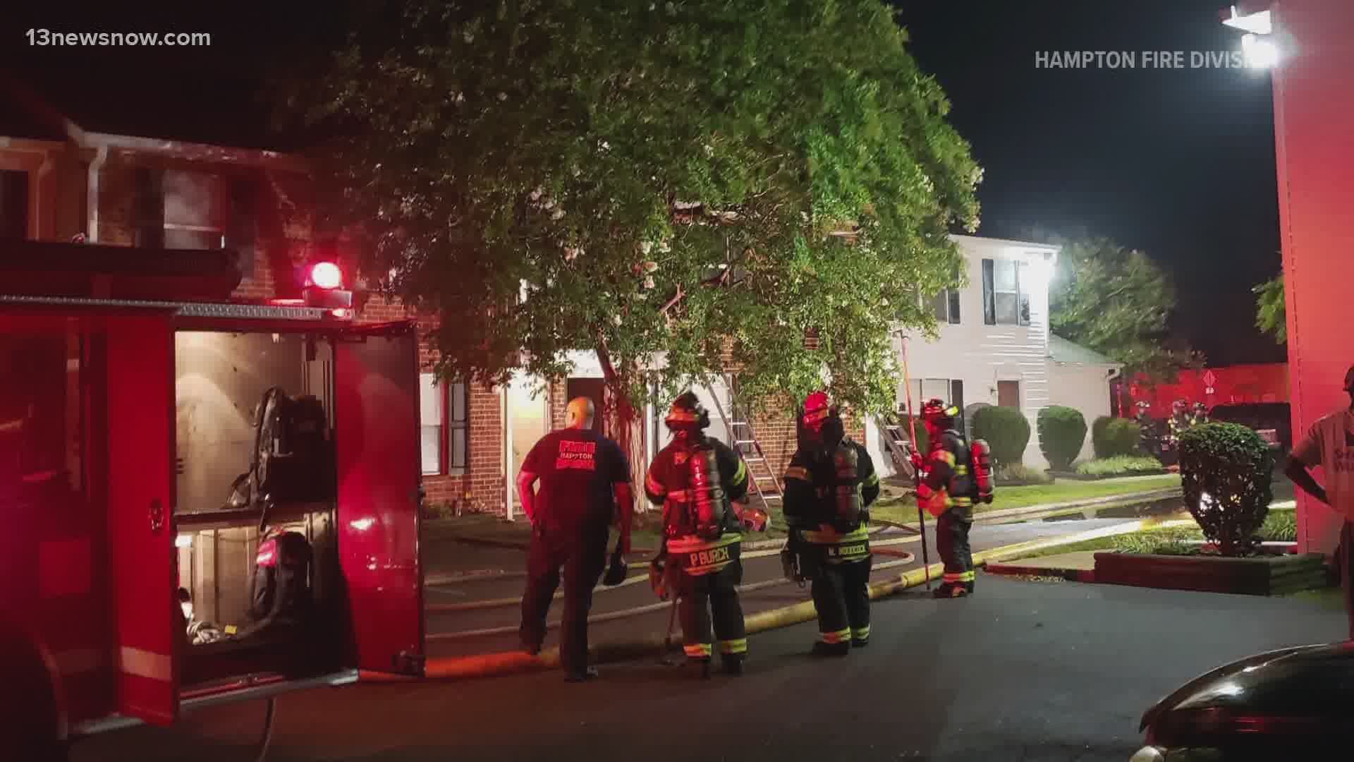 Crews put out a kitchen fire at a Hampton apartment then found a 60-year-old woman unconscious in the home.