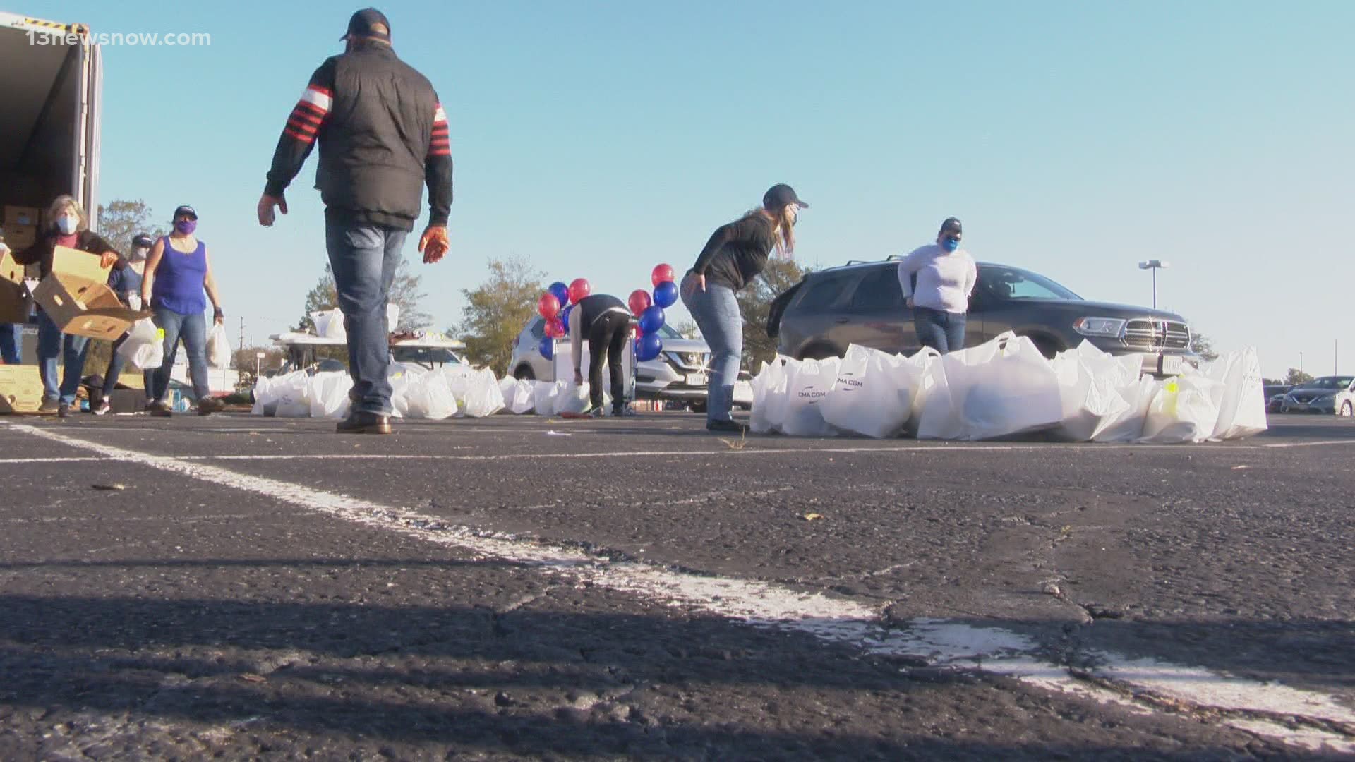 Teams worked to unloads 2,000 frozen turkeys and give them to people who needed a free turkey this Thanksgiving.
