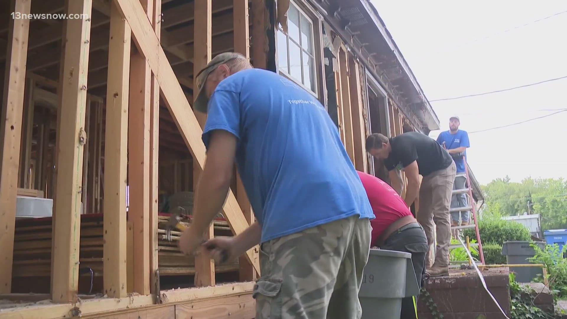 The family that will eventually move in spent the day helping crews out!