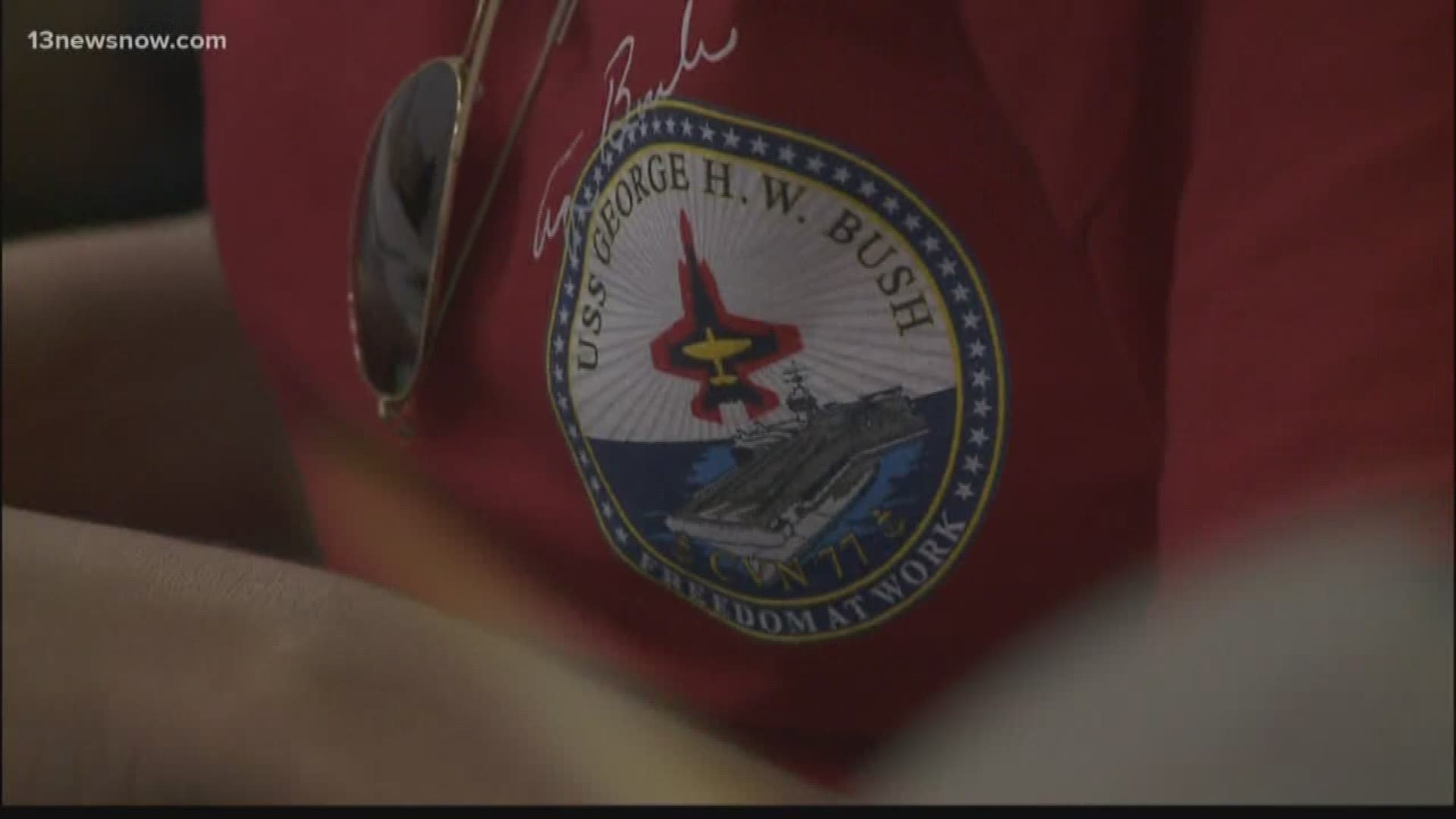 Nearly 1,000 sailors from the USS George H.W. Bush honored the birthday of the former president.