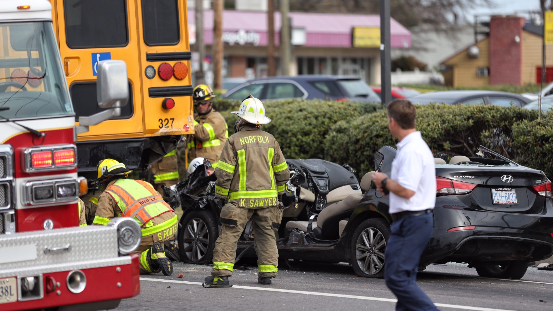 A crash between a school bus and a car in Norfolk landed one person in the hospital with serious injuries. No one on the school bus was hurt.