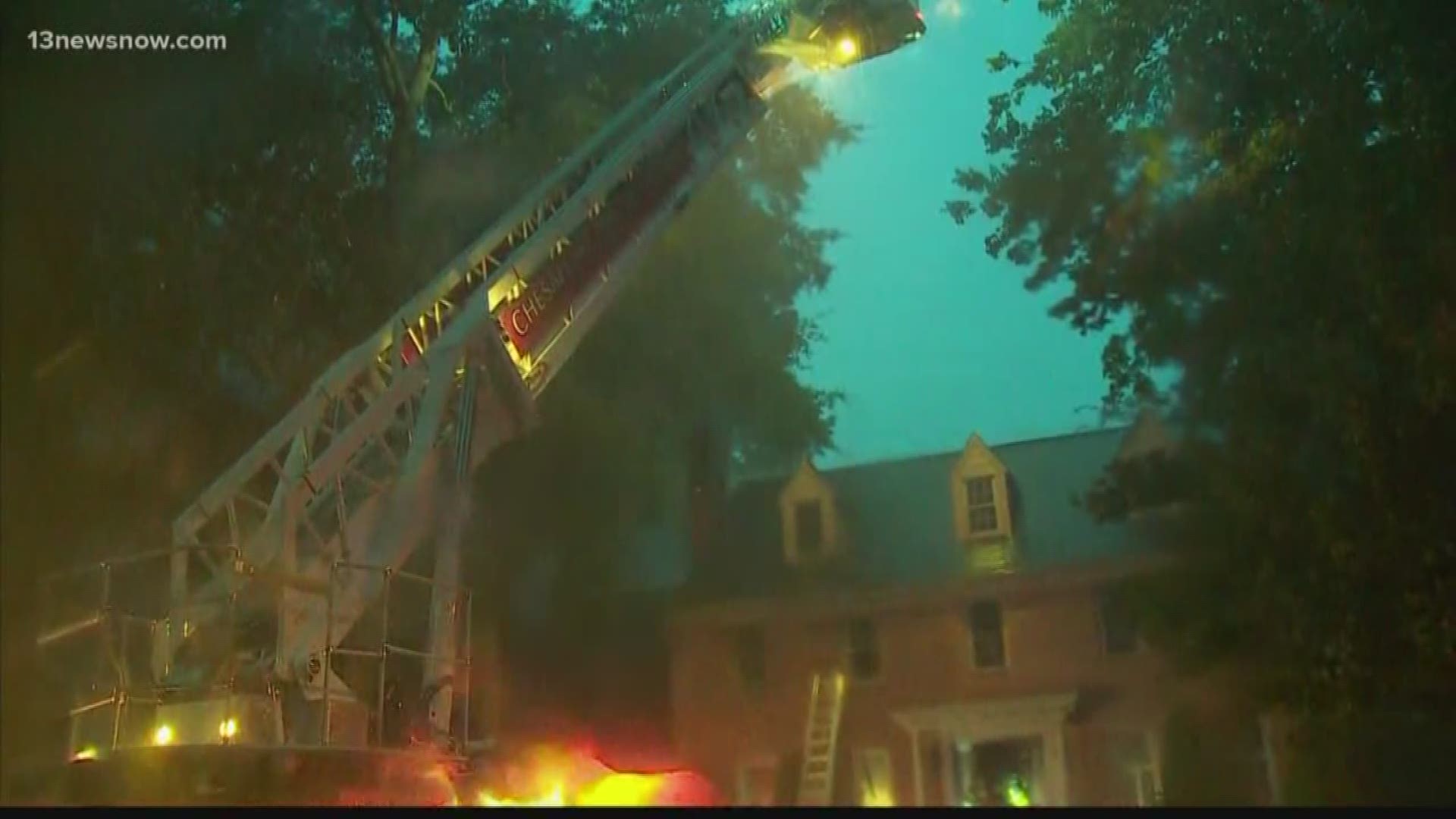 Two people were displaced after flames engulfed part of their home in Chesapeake.