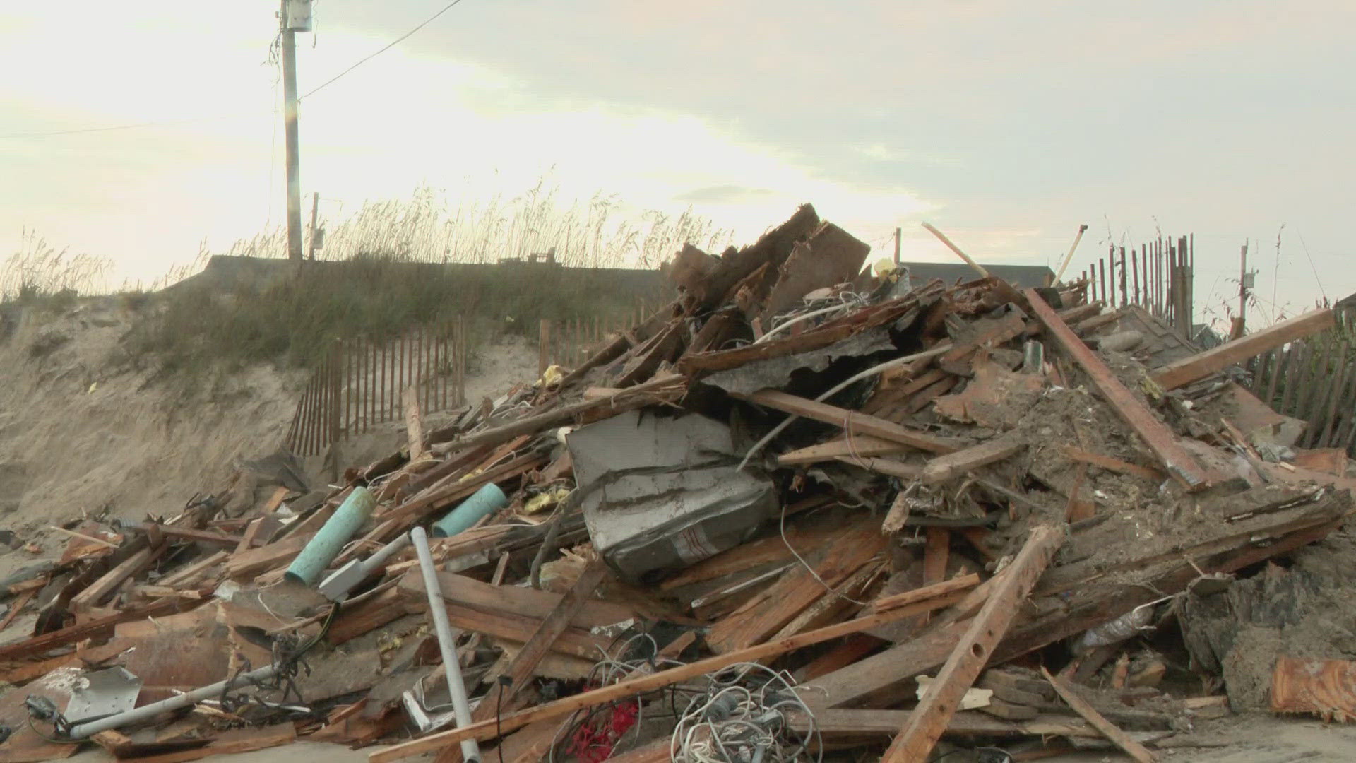 The National Park Service said the house is now one of three to fall into the water this week. Overall, it’s the 10th home to collapse over the past four years.