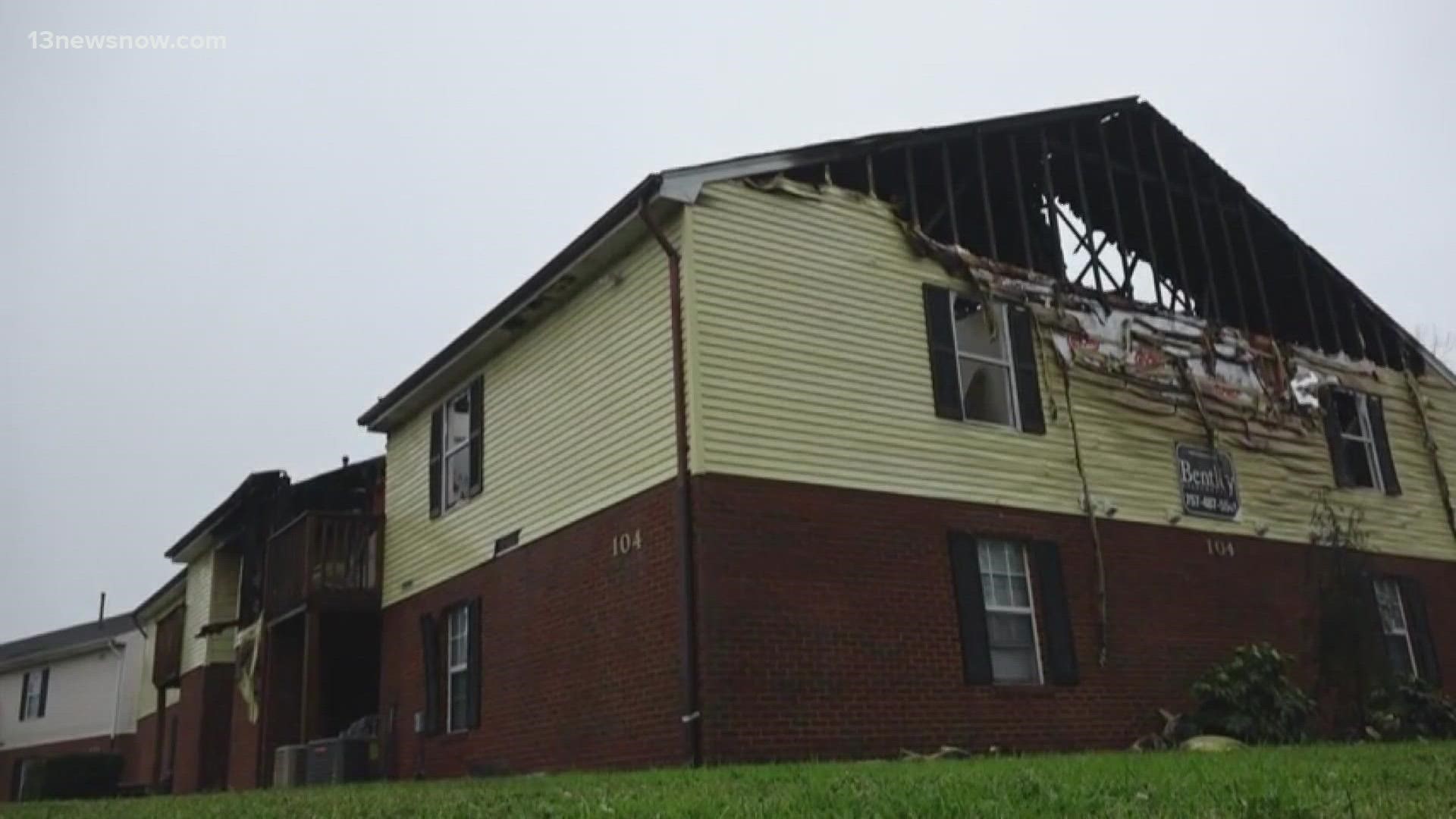 Three fire departments worked together to try to put out the fire at the Cradock area apartment building. The fire ended up burning through the roof.