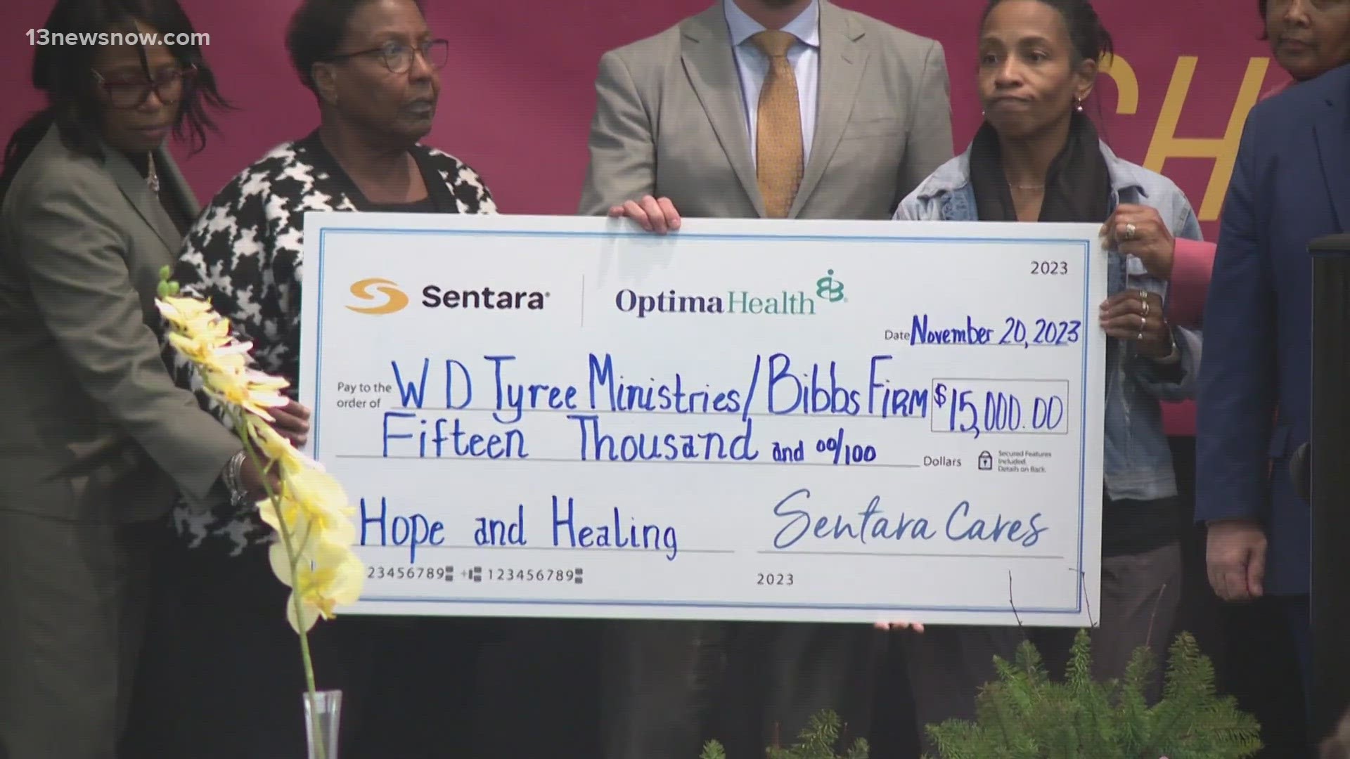 Sentara representatives presented impacted families a $15,000 dollar check to support them.