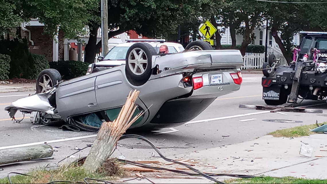 Car flips after ramming into telephone pole in Norfolk