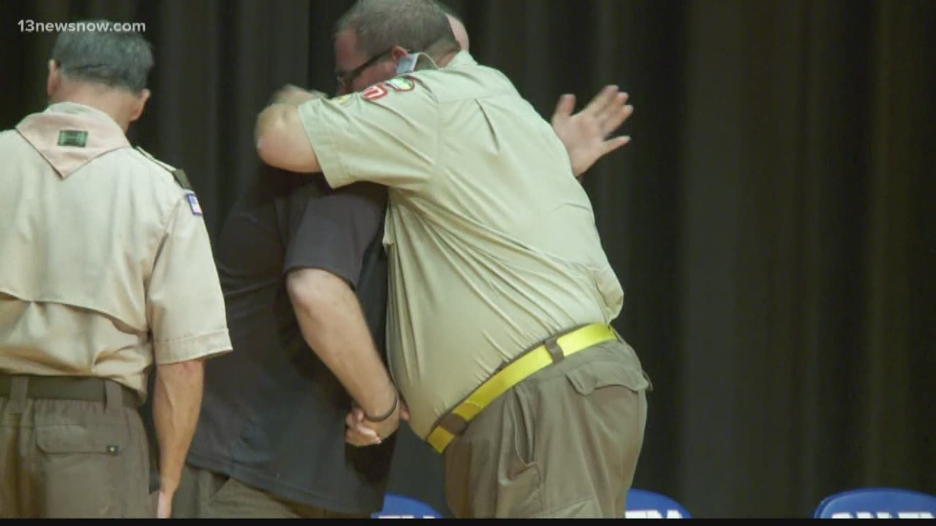 A local Boy Scout leader received a special honor for jumping into action at the scene of a horrific crash.