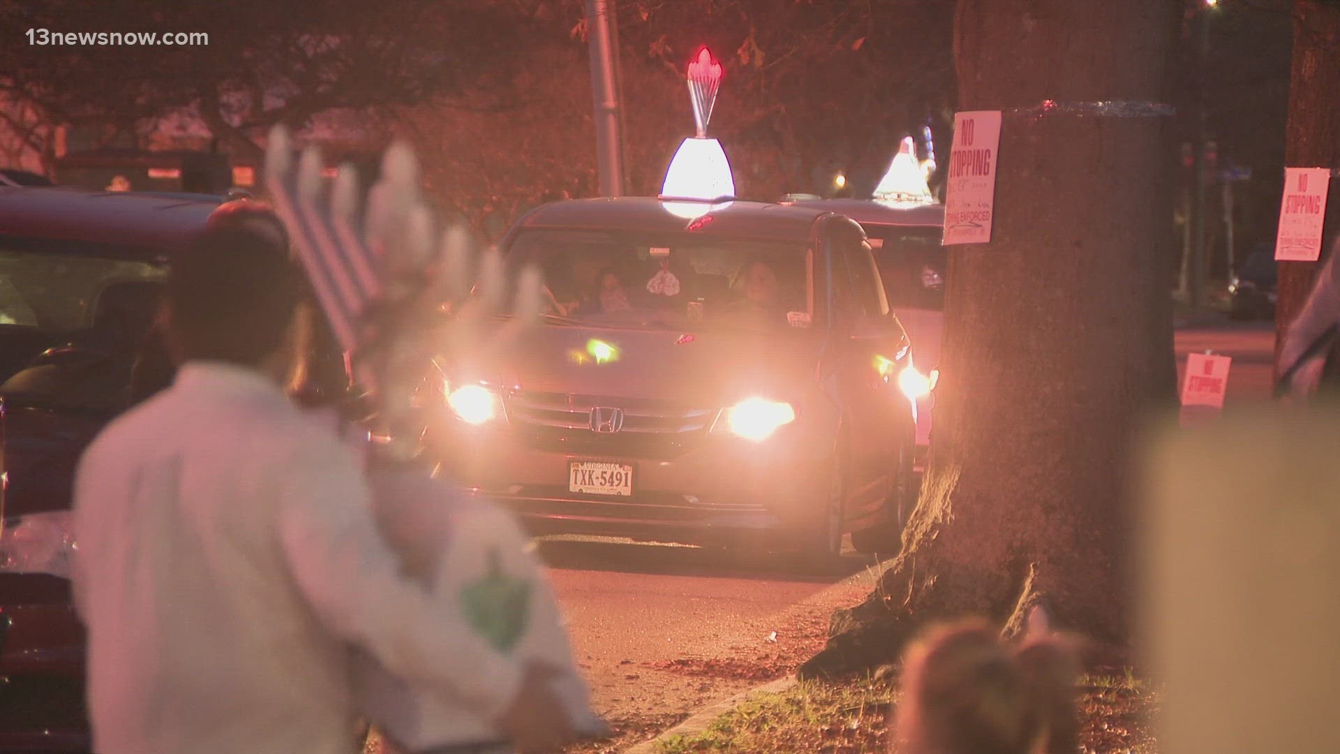 Wednesday night, you may have spotted dozens of cars outfitted with giant menorahs, making their way through Norfolk's Ghent neighborhood.