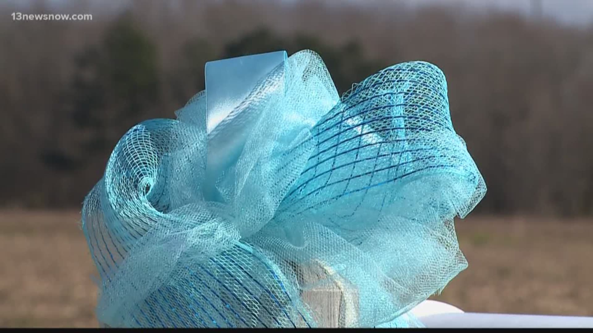 A Virginia Beach community is mourning the loss of a 4-year-old-boy and showing their support with blue ribbons.