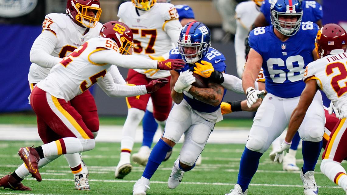 Washington beats Giants on Gibson TD run, McCain's 2 INTs