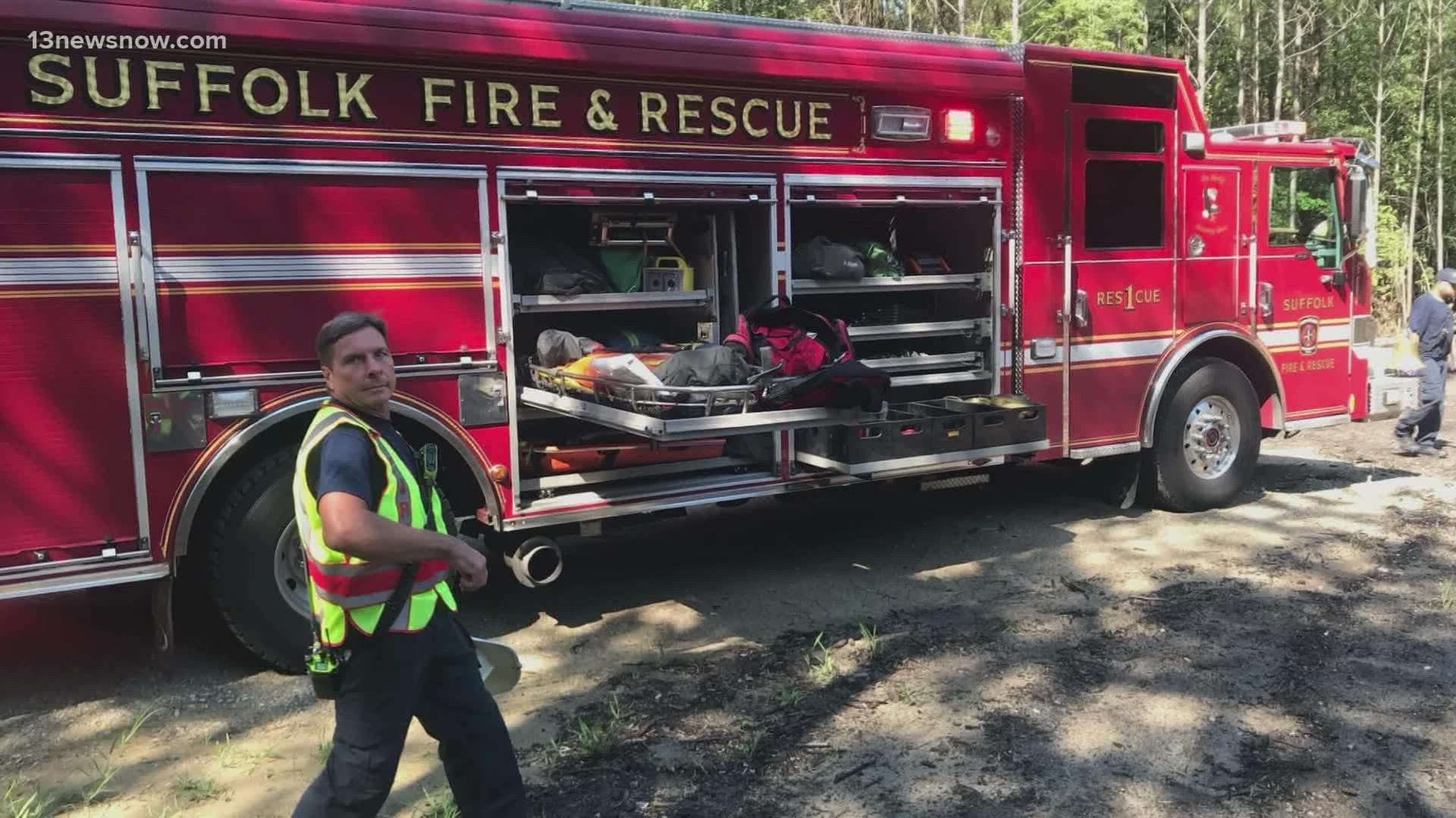 A man was pinned underneath an overturned excavator, police said.