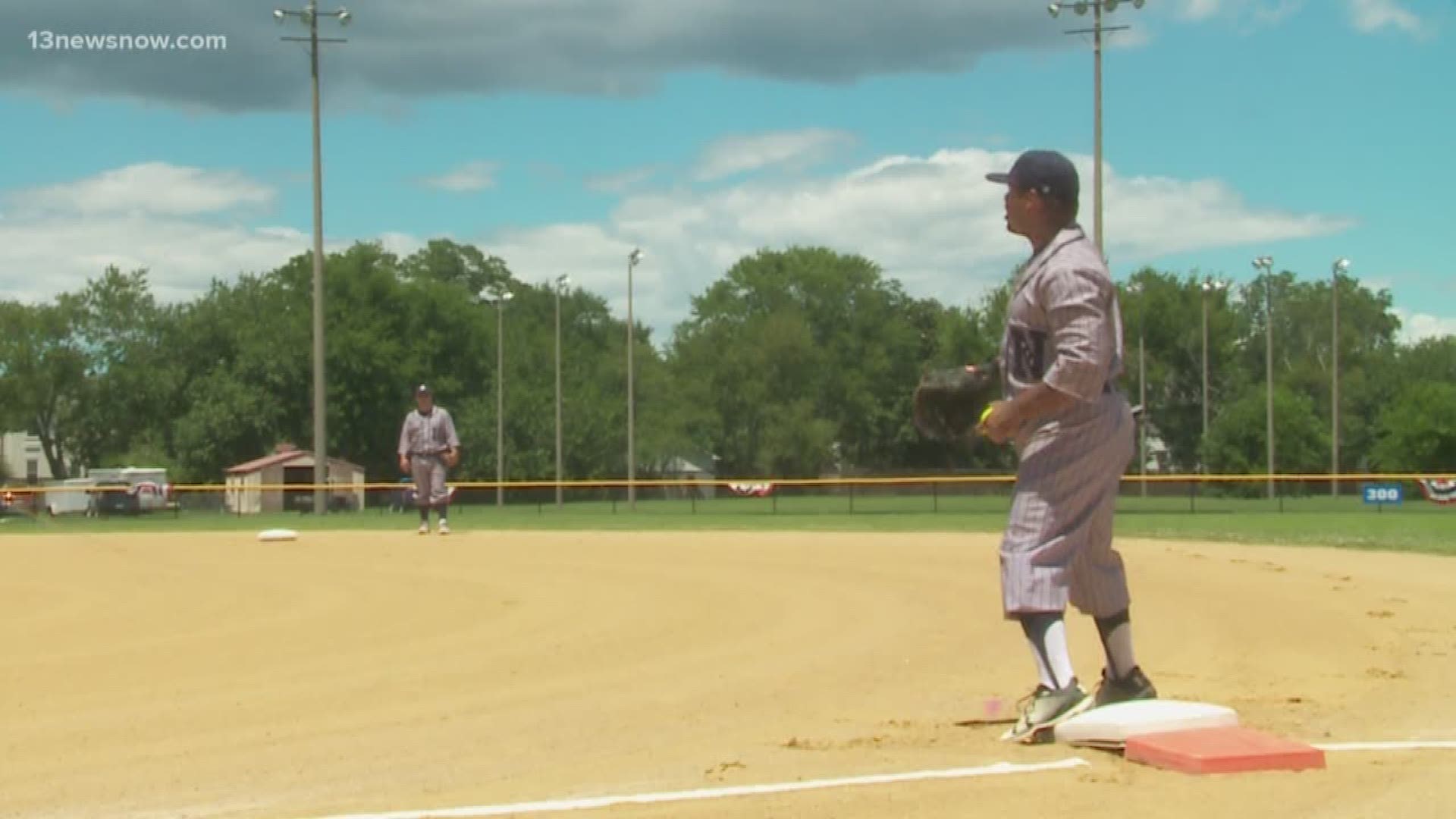 The players donned World War II-era uniforms and played on the same field where some baseball greats took their positions.