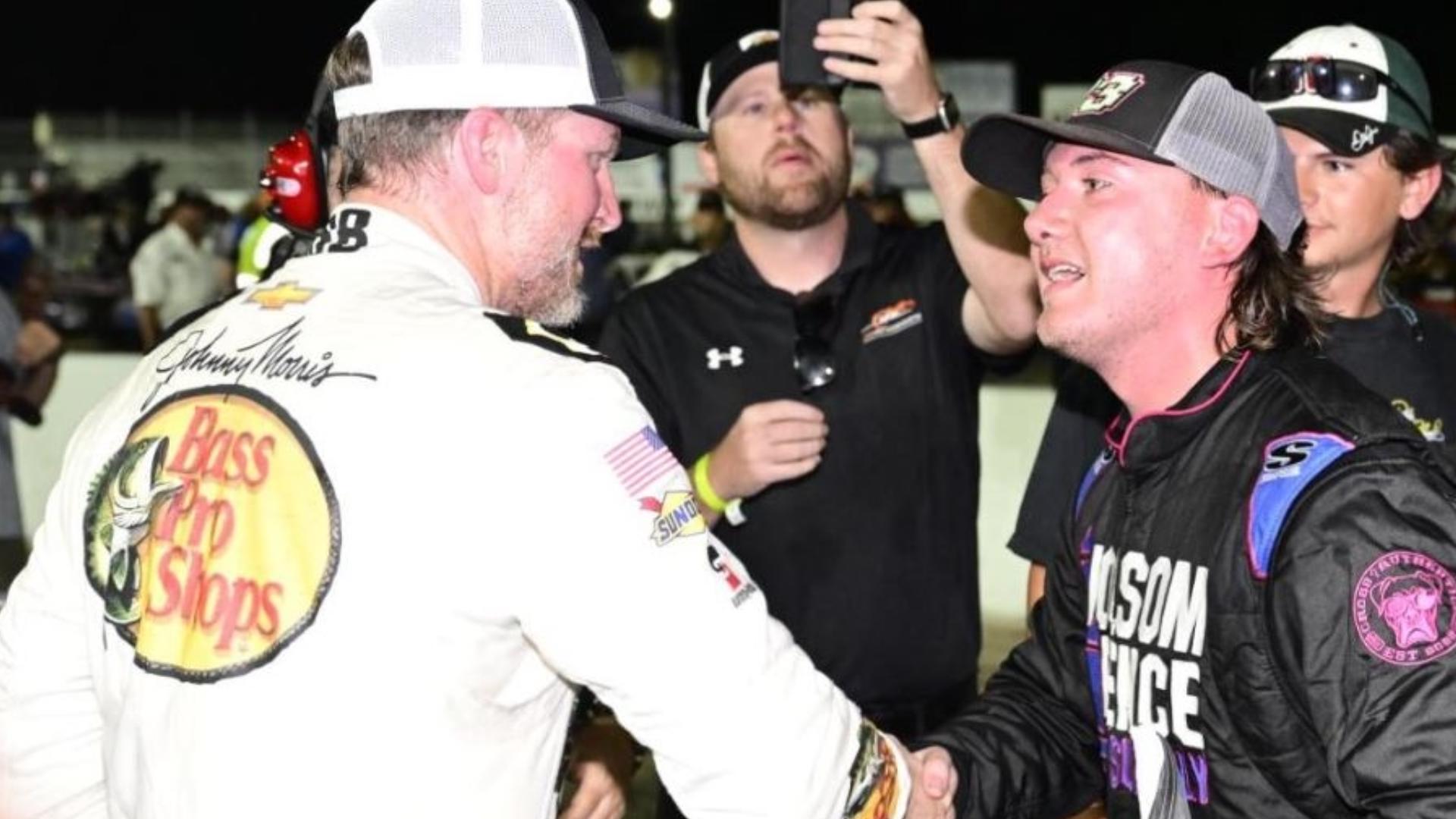 Chesapeake's Brenden "Butterbean" Queen shakes hands with NASCAR Hall of Famer Dale Earnhardt, Jr. Queen won his 3rd Hampton Heat. Dale, Jr. was 5th.