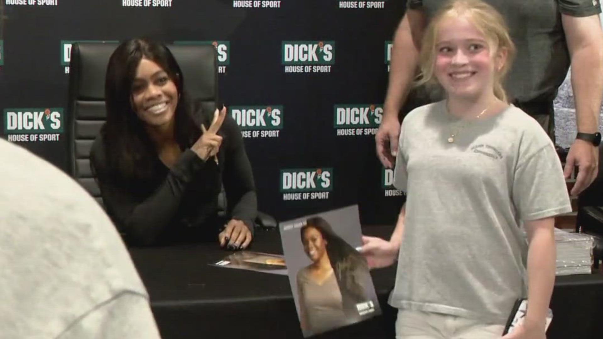 Virginia native, gymnast and gold medalist Gabby Douglas made her way home Saturday for some autographs and time with fans.