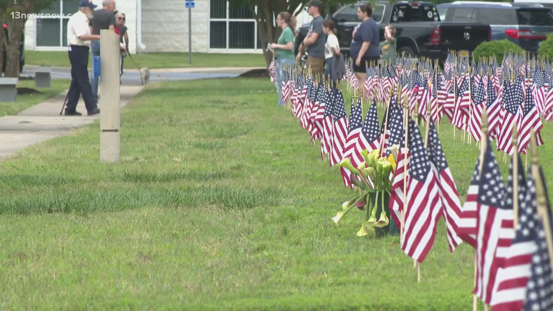 Volunteers are needed to plant American flags at the 74-acre Albert G. Horton Jr. Memorial Veterans Cemetery in Suffolk, where over 13,000 veterans are laid to rest.