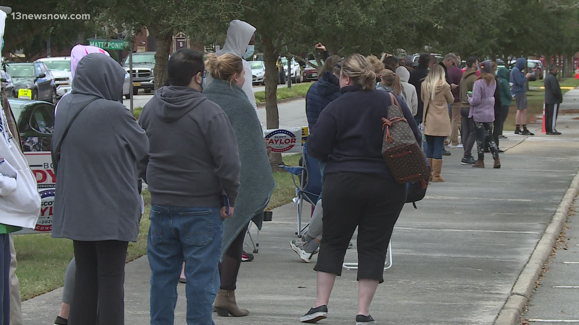 Early voters had to wait in a line that stretched for blocks - but many said it was worth the wait, and they were glad to see people at the polls.