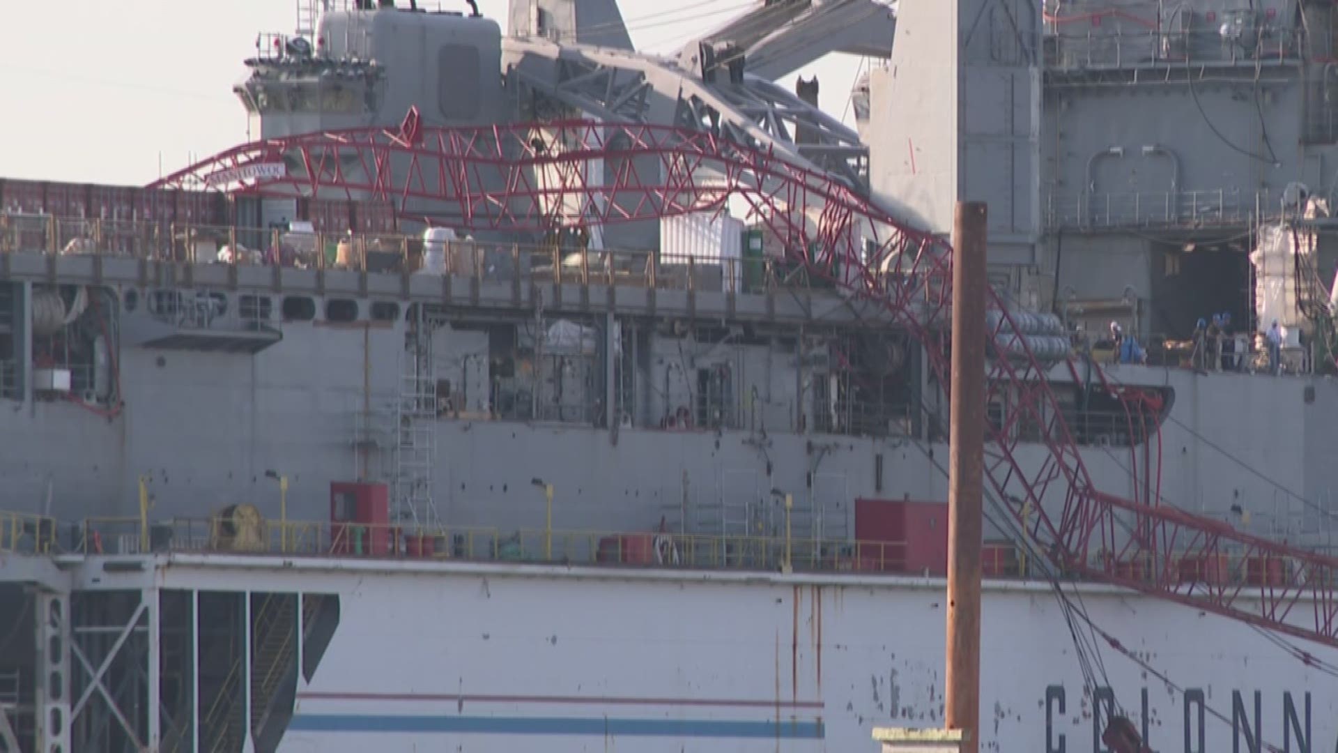 Two sailors were injured when a Colonna's Shipyard crane boom fell onto the USS Gunston Hall. The sailors suffered minor injuries.