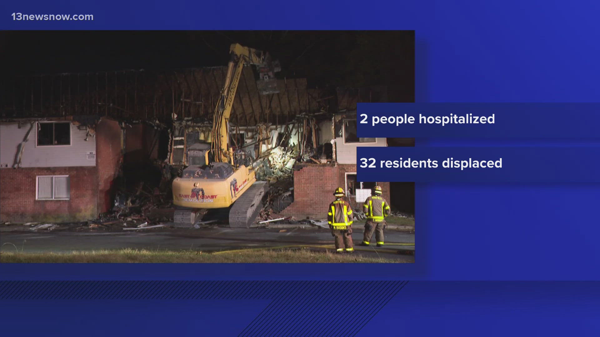 Crews began tearing down the apartment building tonight after it was destroyed by fire.