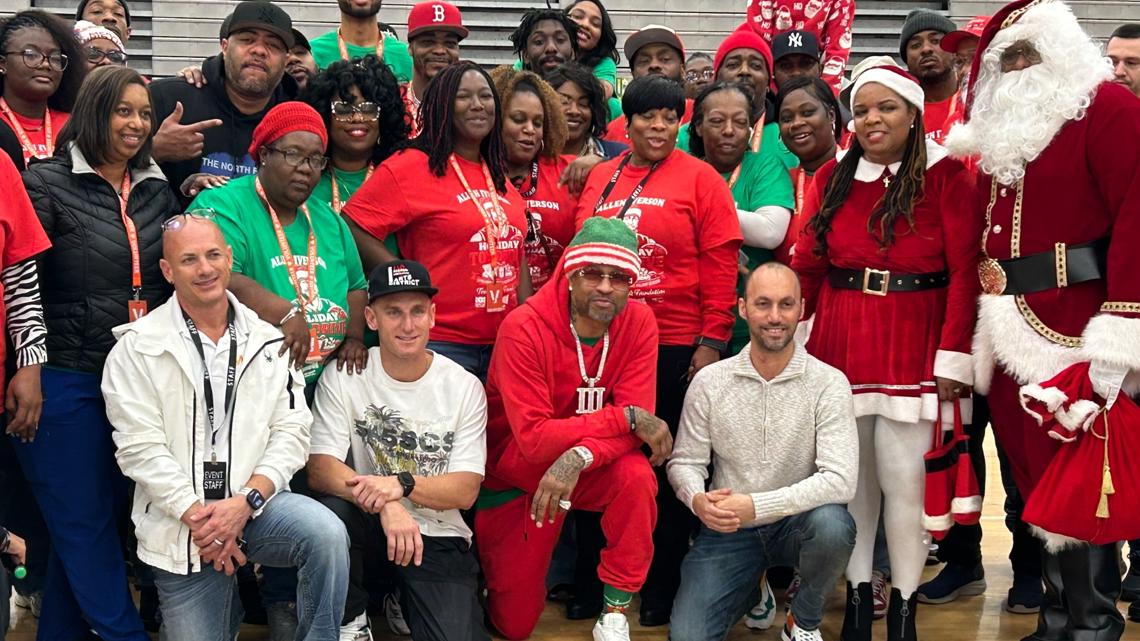 NBA legend Allen Iverson helps give away thousands of toys to